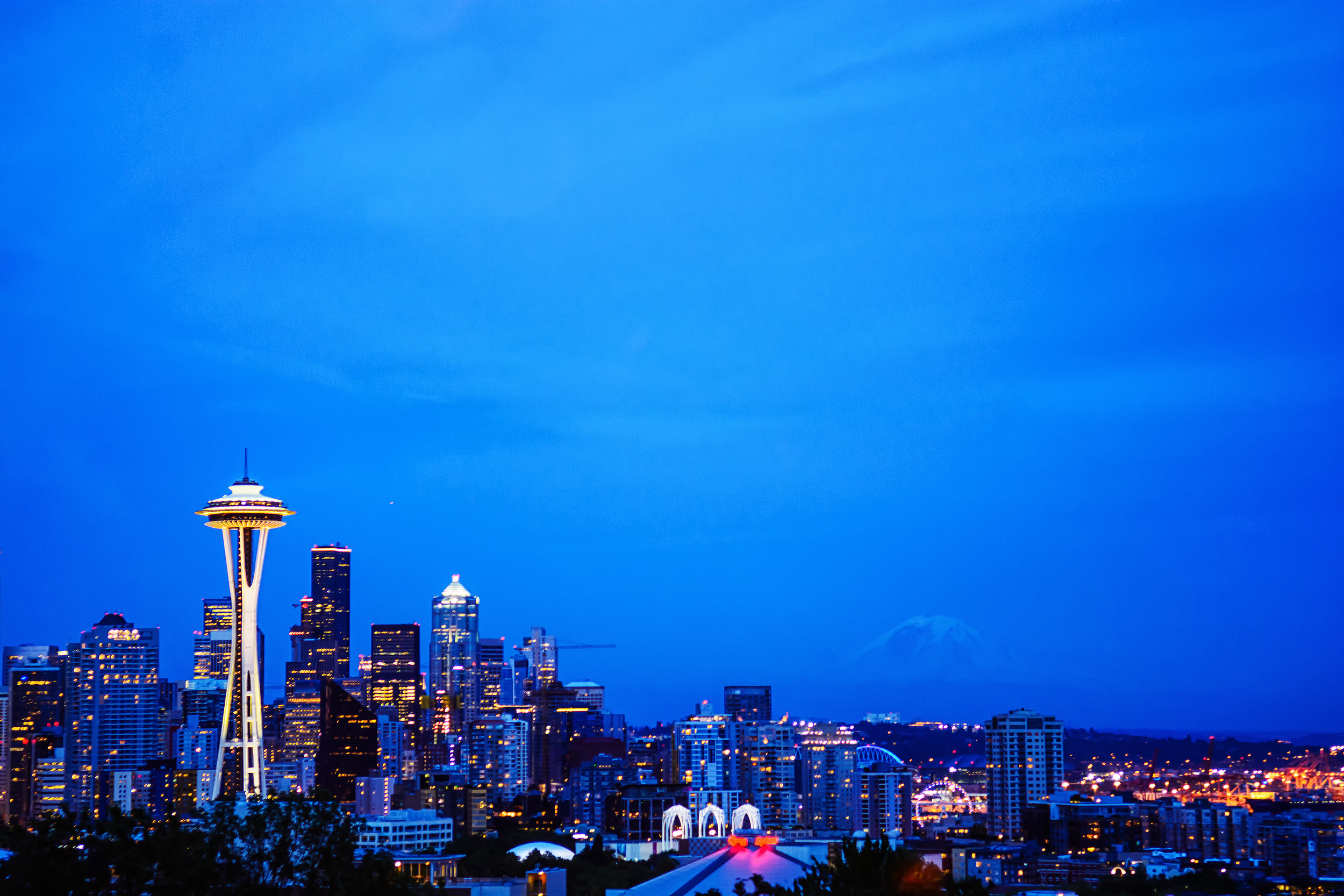 7/7 Photo: Yeah, Seattle is a beautiful Skyline, Mt. Rainer in the background (bucket list to climb that peak)