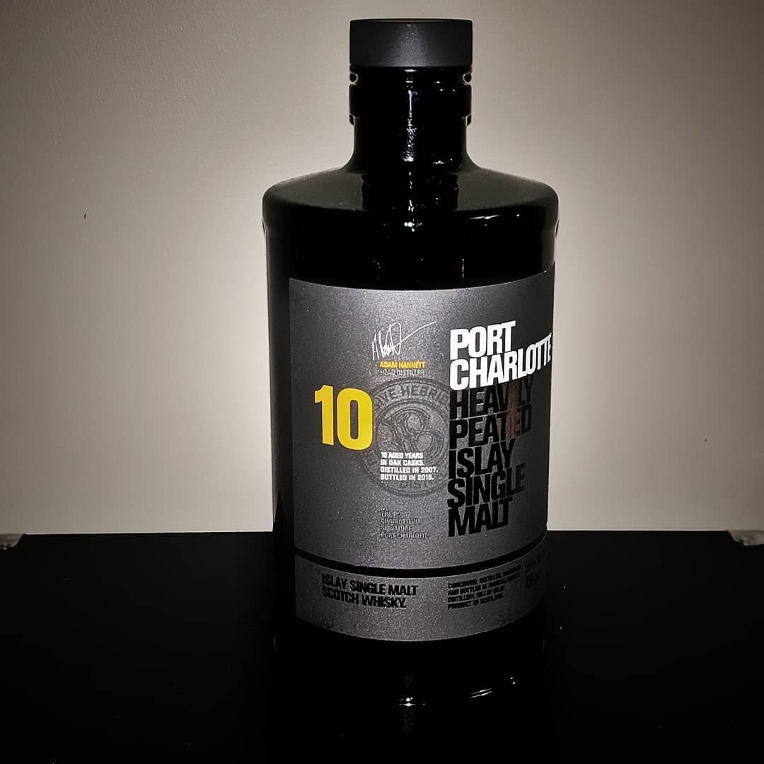 Bruichladdich Port Charlotte
Heavily Peated
Islay Single Malt Scotch

This bottle was a late Christmas gift from a good friend. It definitely went way too quickly. It has a nice nose, and rich flavor. The peat is balanced by the saltiness. The finish