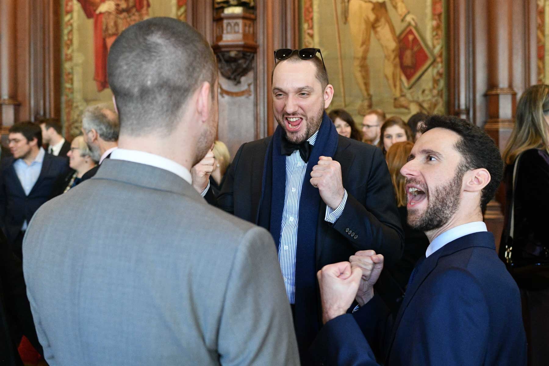  Encouragement for the bridegroom. Weddings offer lots of opportunities to capture moments of emotion and humour, just as important as formal group shots. 