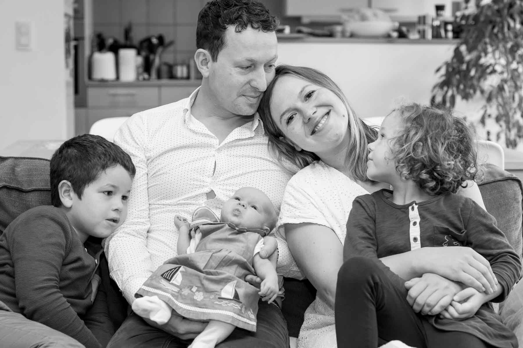  I photographed this family in their home, with their new baby. They were interested in having some black and white images, and I particularly like the composition of this one. 