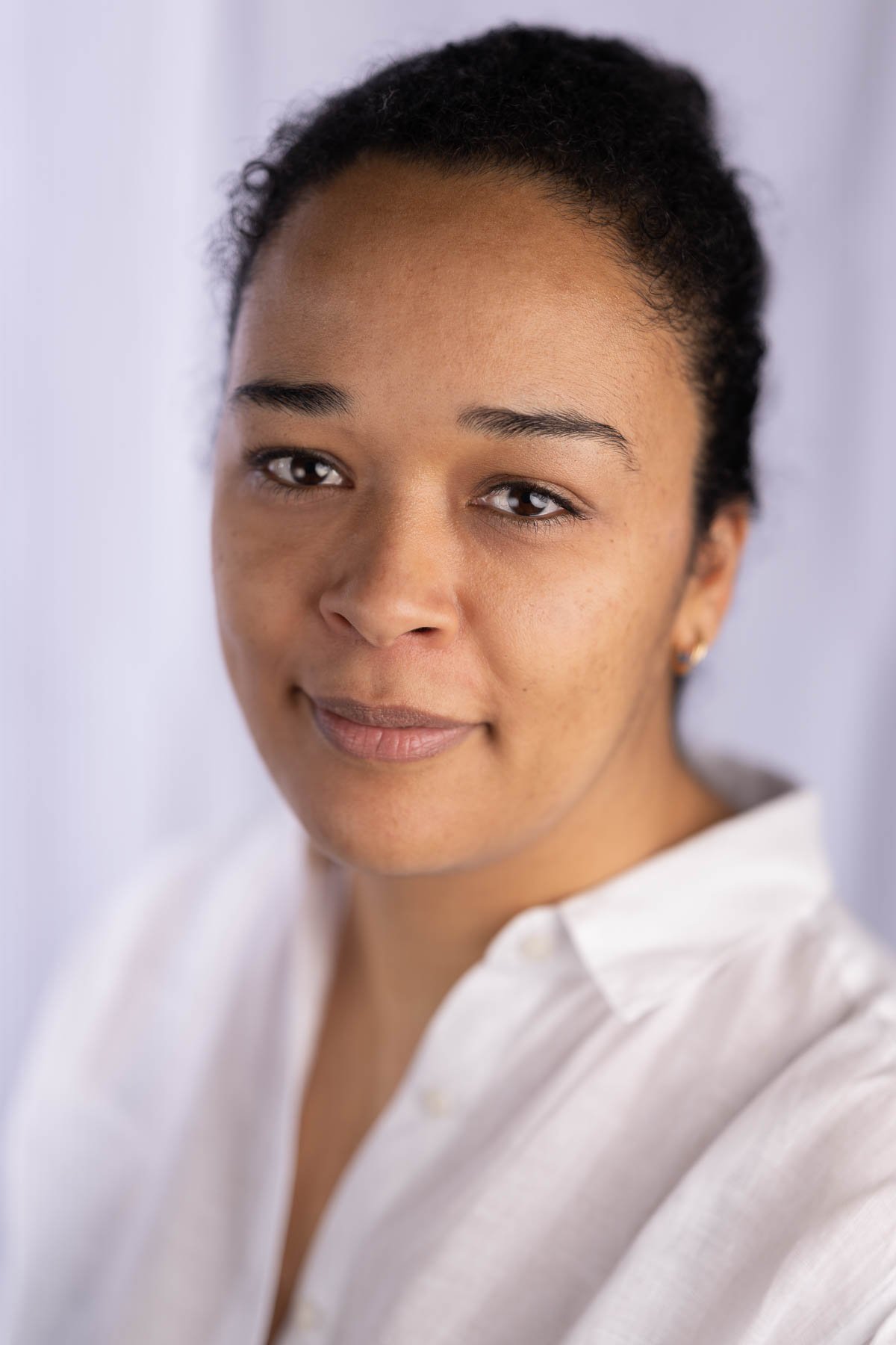  Close-up studio portrait shot against a white cloth background 