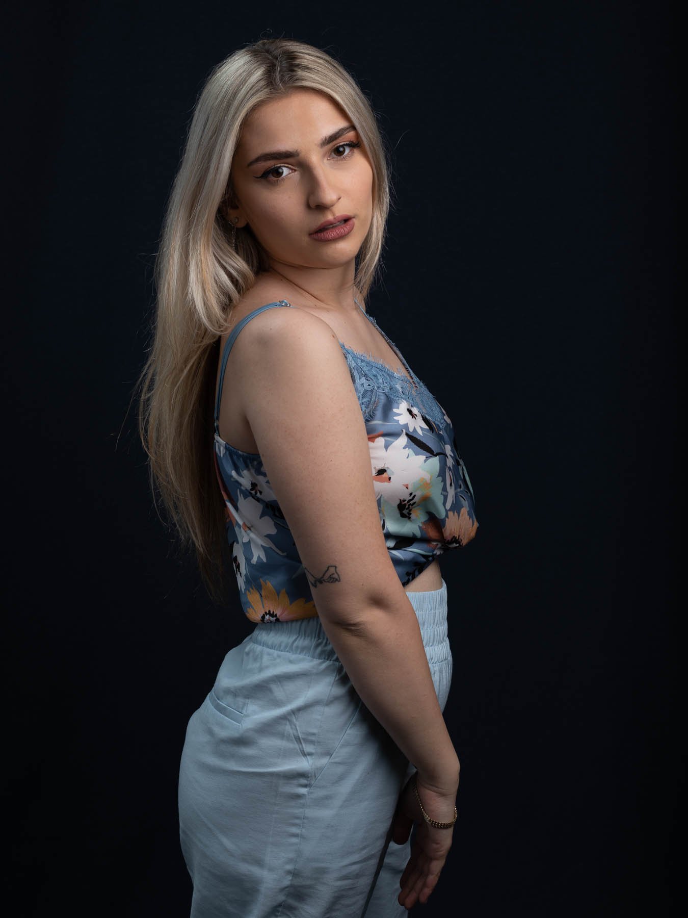  This young woman came to the studio to create fashion shots for her first foray into the world of modelling. I like the way her personality comes through in this neutral pose. 