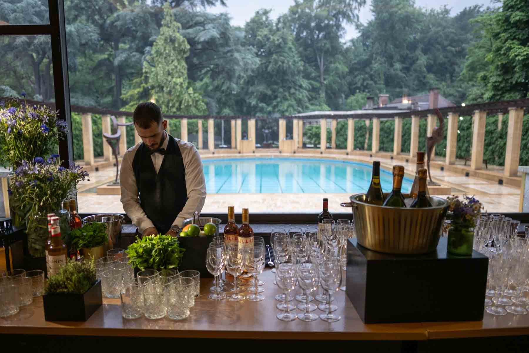  Bar staff preparing for guests to arrive at a reception at the Villa Empain in Brussels 