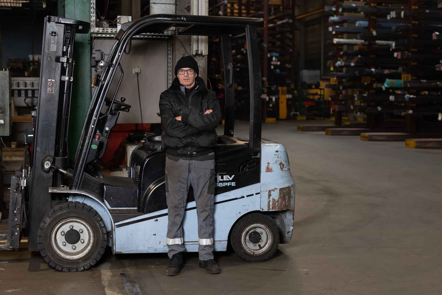  Driver and forklift in the Molenbeek depot of  NV Jean Wauters , specialist steel distributor 