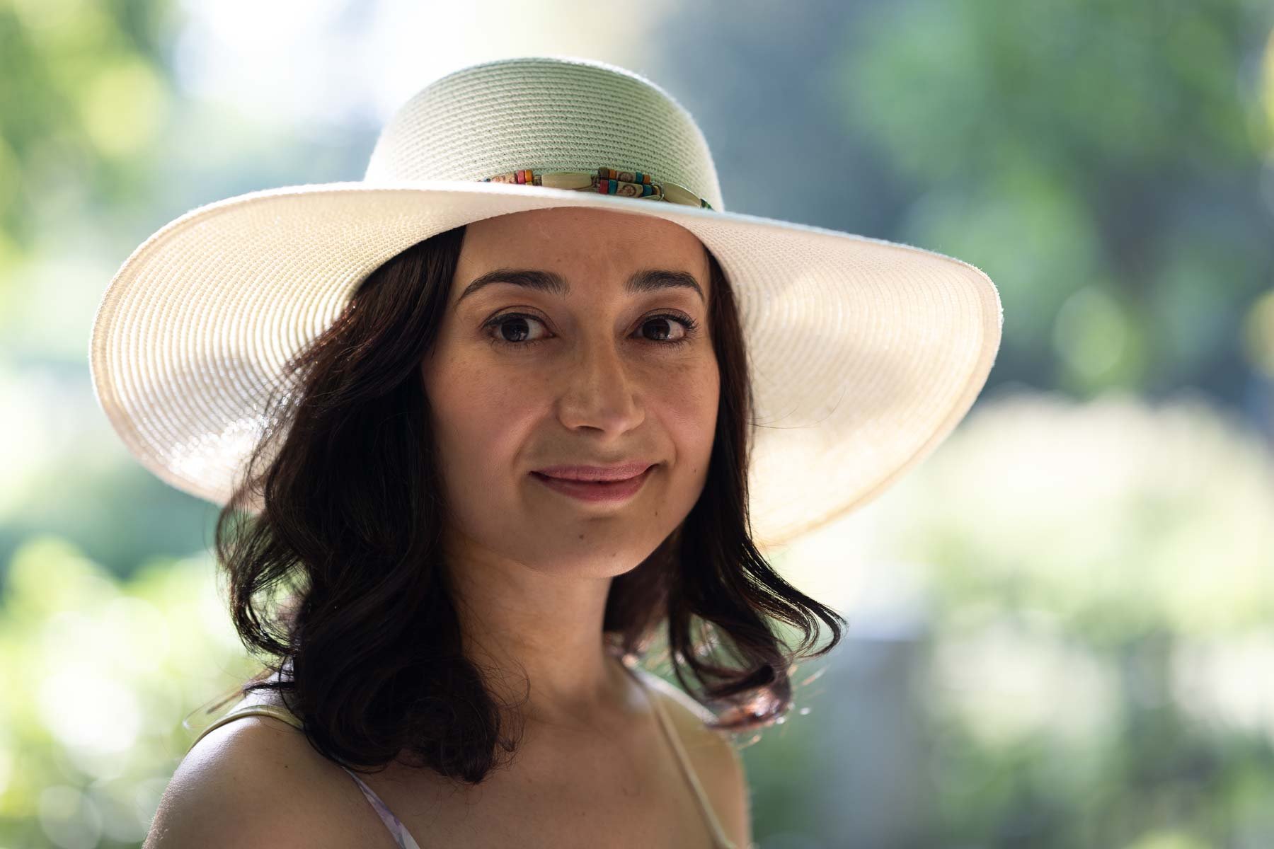  The model’s straw hat turned strong summer sunshine into beautifully soft light on her face. Shot in Brussels’ Parc Josaphat. 