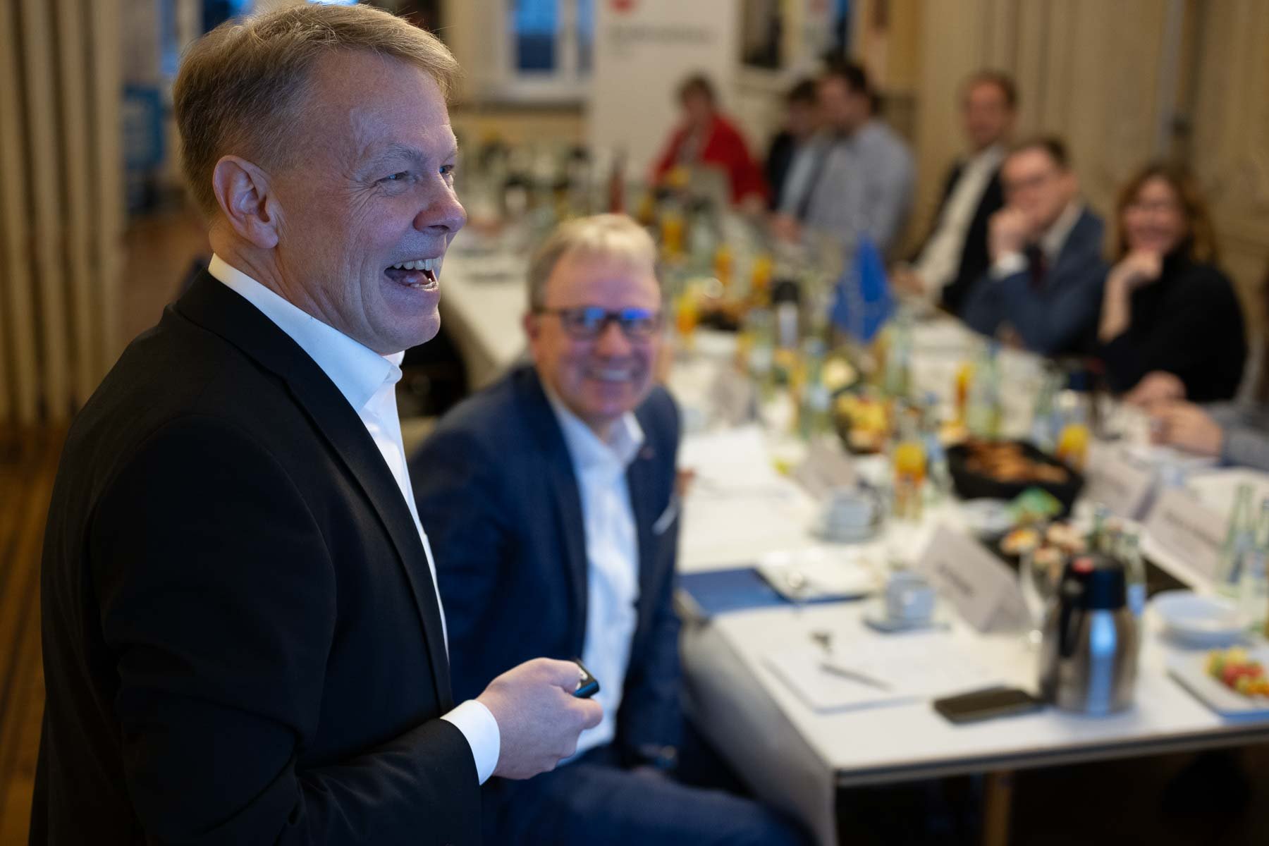  Laughter during a presentation at a breakfast meeting in Brussels 