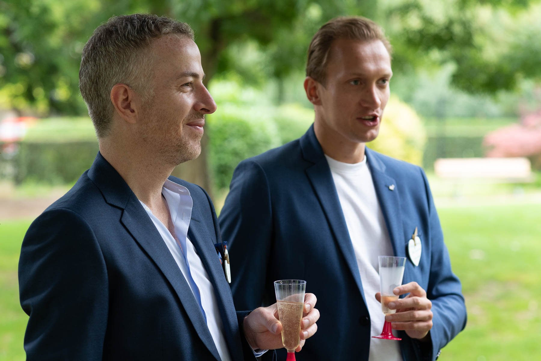 A couple at a friend’s wedding party