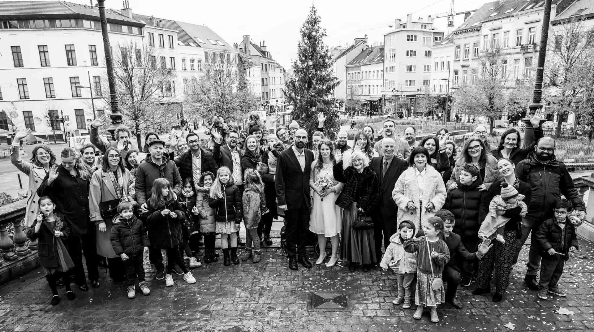  Group photograph on Place Fernand Cocq after the wedding ceremony in Ixelle’s maison communale. 