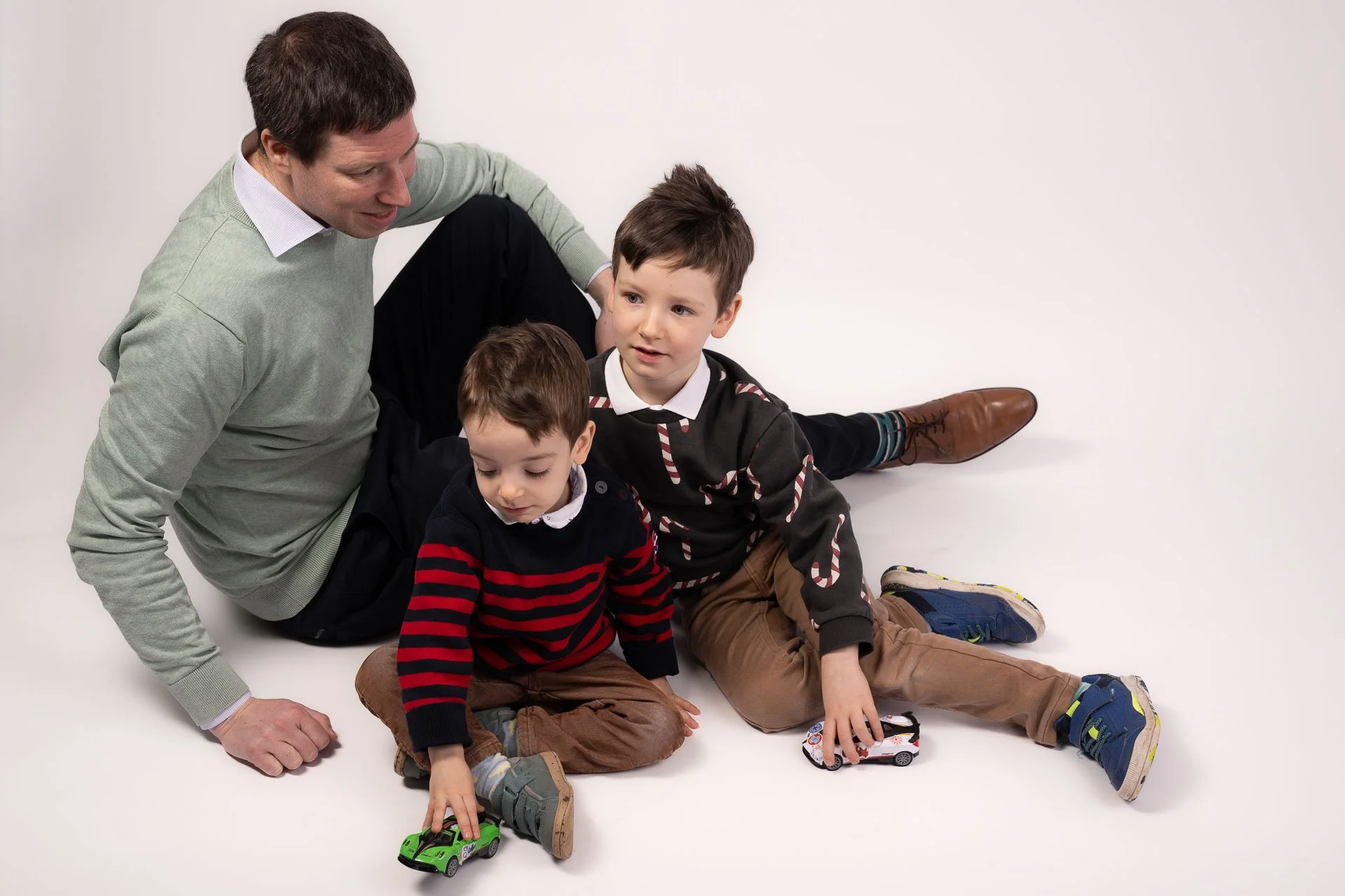  A father and his two sons, from a family photoshoot 