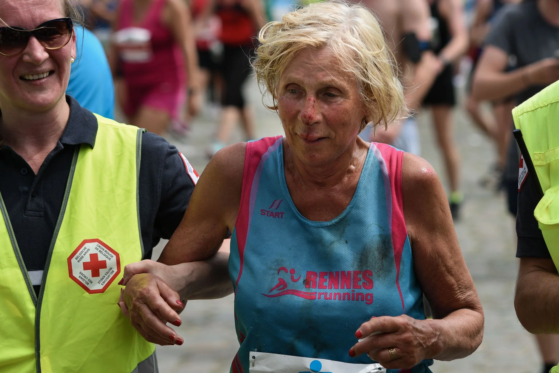  Brussels 20km 2018. This runner had had a nasty fall, and had to be helped at the finish line. 