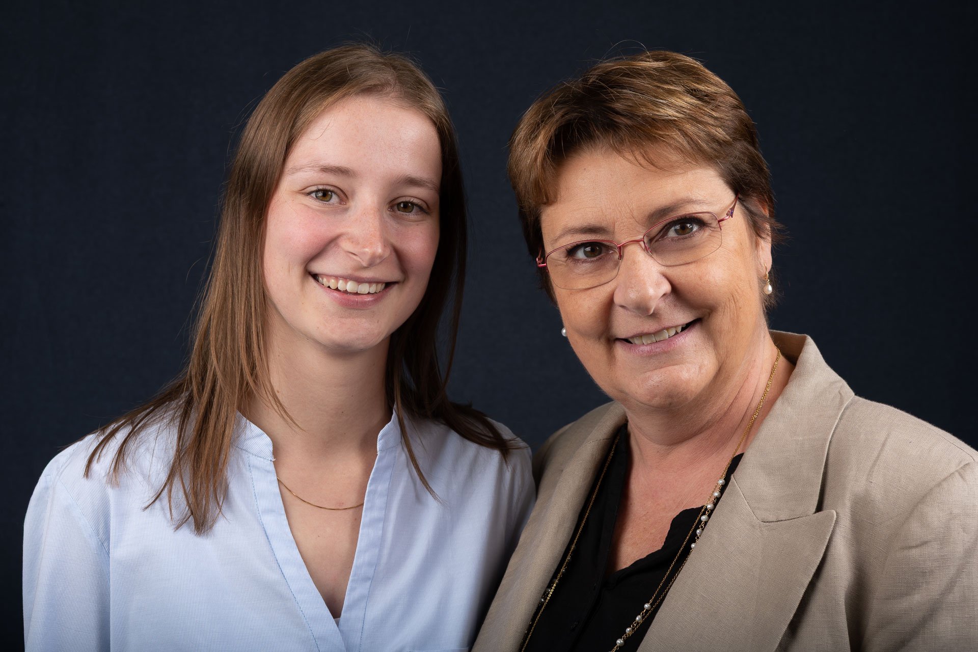  Studio portrait of mother and daughter. 