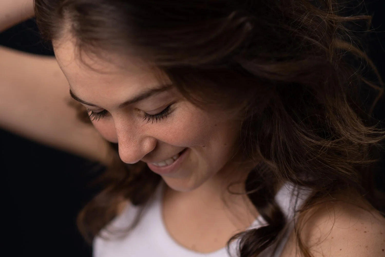 Studio portrait of a young woman smiling