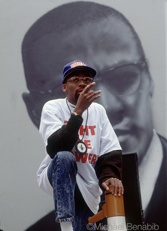 Director Spike Lee with Malcolm X backdrop