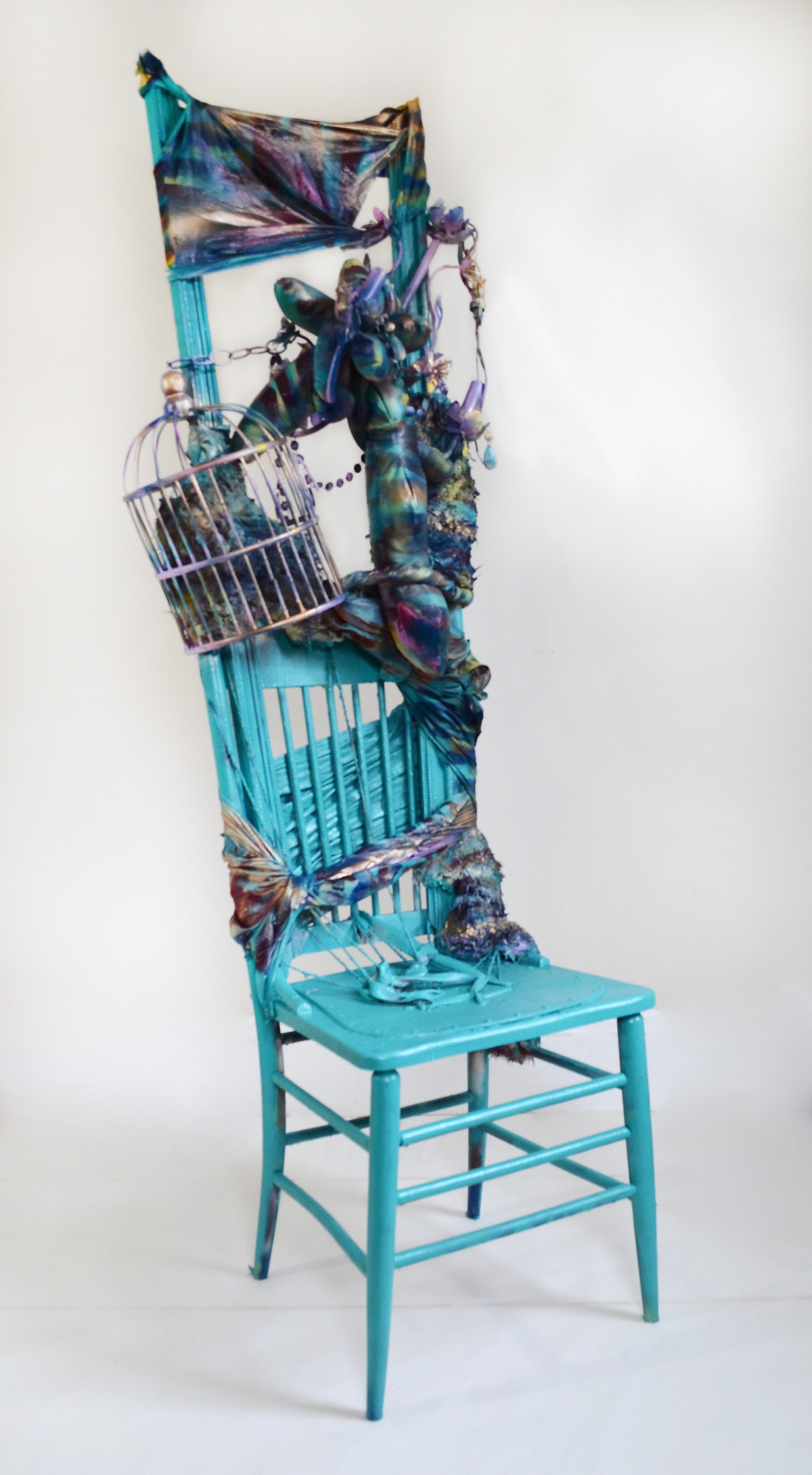 Throne, 2018 6’x2‘x2.5’, Found chairs, birdcage, chandelier, beads, moulding, furry fabric, spray paint, polyester fiberfill
