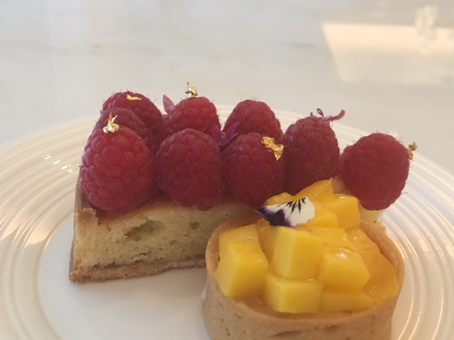 Gilded desserts adorned with flower petals