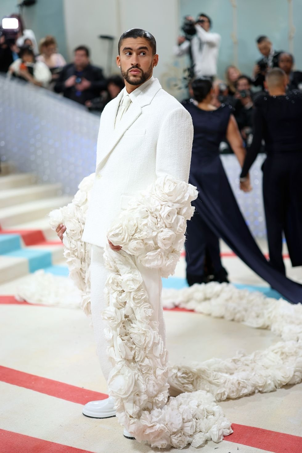 Selena Gomez rocks a beige turtleneck with a Louis Vuitton trench