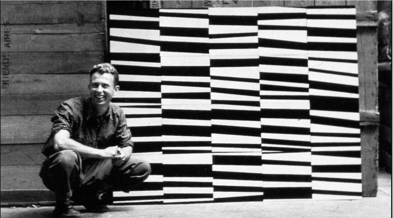 Real artist, crouching.
