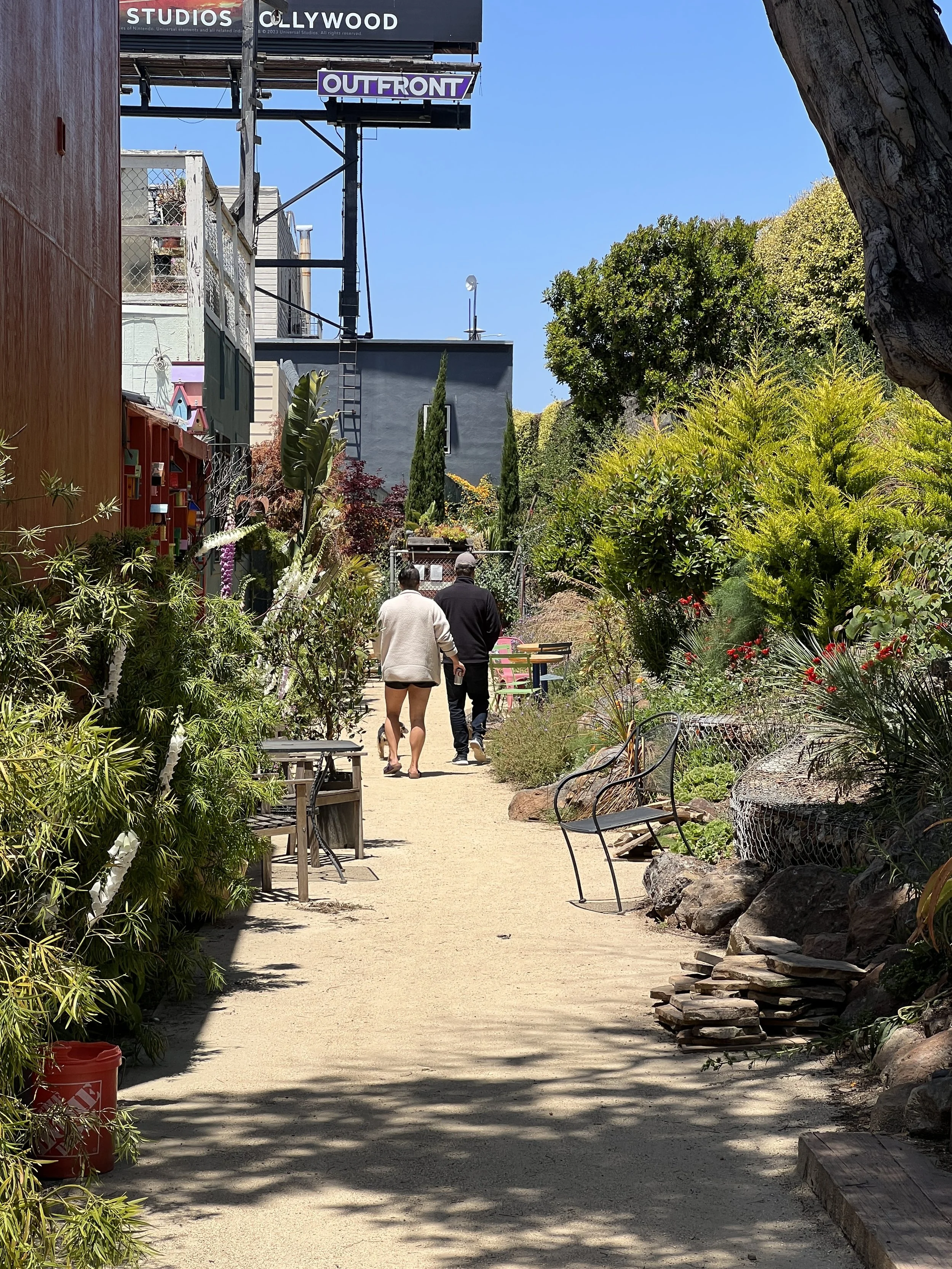 A GREENWAY HAVEN GROWS ALONGSIDE THE HIGHWAY 101 SOUNDWALL