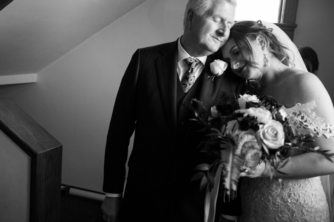 Bride and father before they walk down the aisle