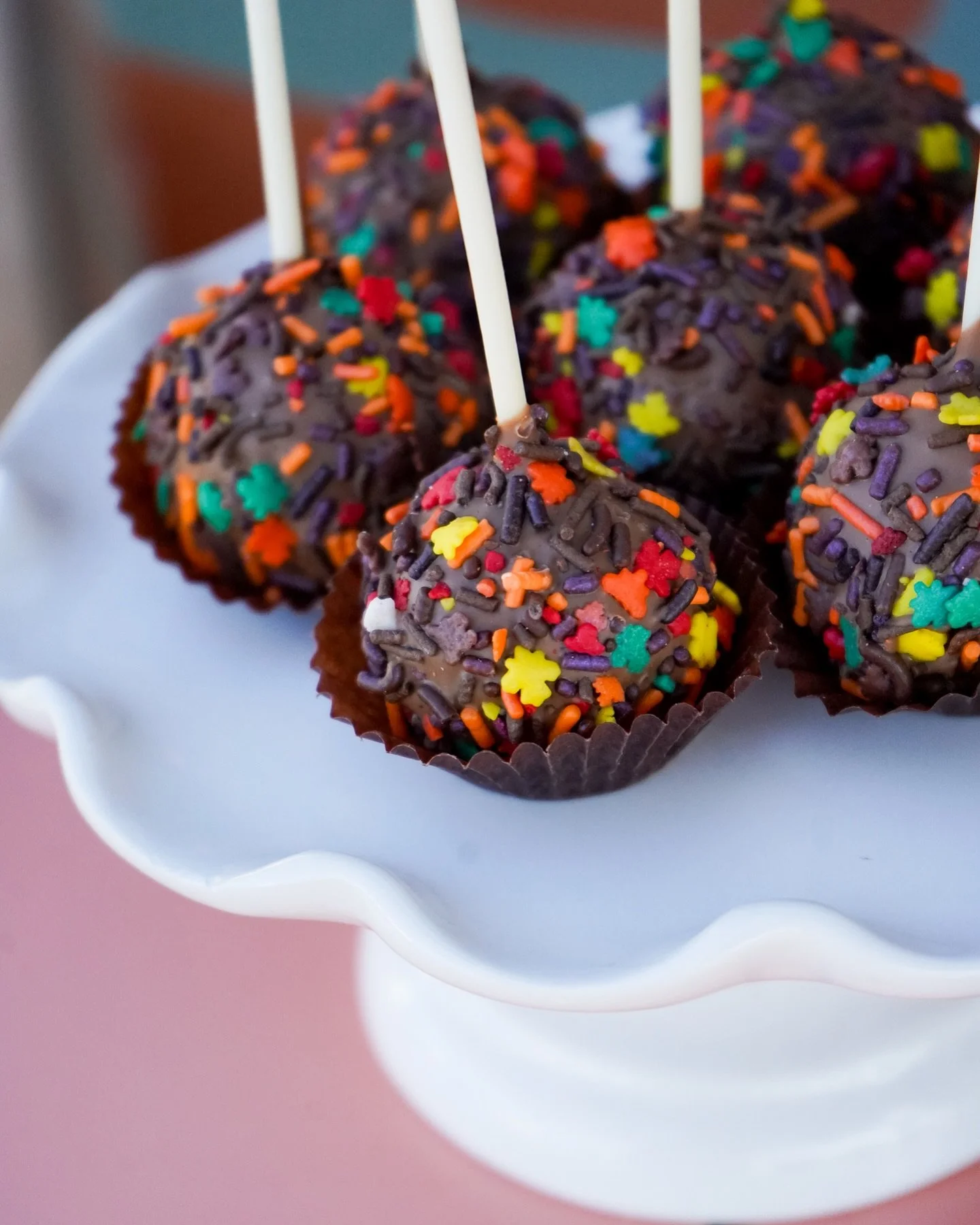 Feeling the spirit of the holiday season early! Come to our shop and see what amazing sweets we have to offer! Check out our festive cake pops&mdash;perfect for Fall! 🍁