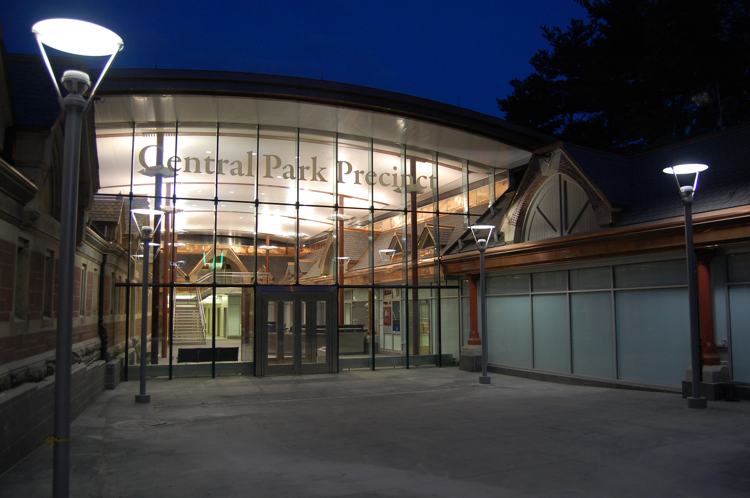The Central Park Police Precinct , combines elements of many previous projects. This is a complex occupied facility, which required new systems, new incoming services, and integration of historic preservation, restoration, and new construction. Given the size and complexity of this project, the first phase was the design and construction of a temporary building. This allowed for the 24 / 7/ 365 precinct to be renovated in situ without disruption. We prepared a ten-stage phasing plan that incorporated elements such as an existing fuel cell and a new 1600 long electrical duct bank, extension of the city water service, relocation of sewer lines, and a 20” gas main. The architectural challenge of the project was to recognize and emphasize the original planning concept and utilize the courtyard as a circulation space that could be enclosed. 