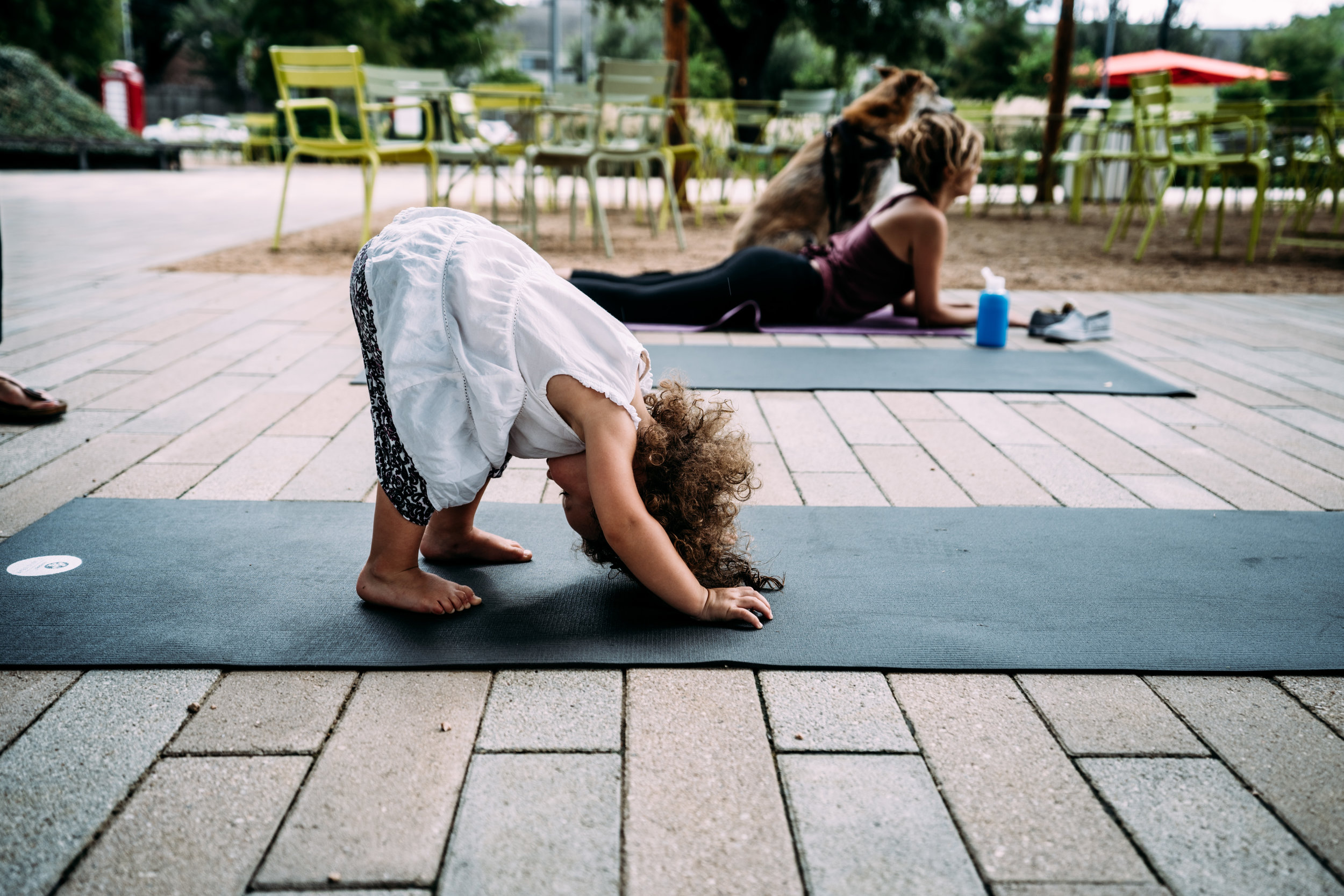 Little girl does yoga