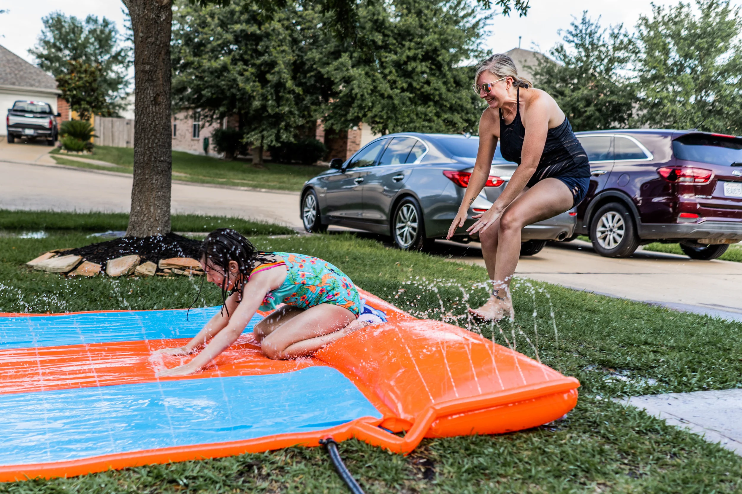 mother and daughter slip n slide-1.jpg