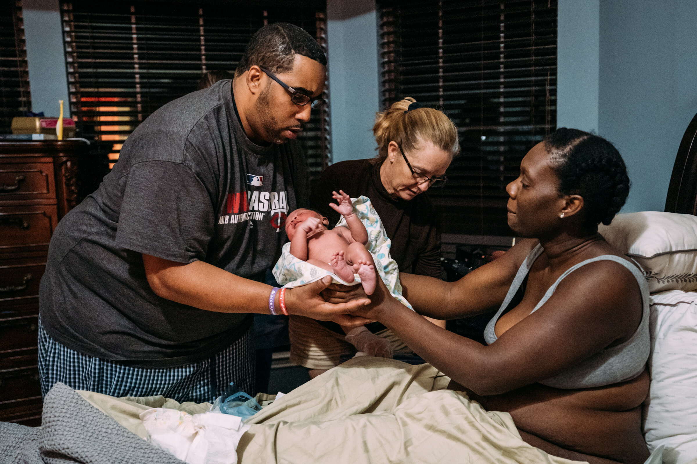  Dad holds his newborn for the first time 