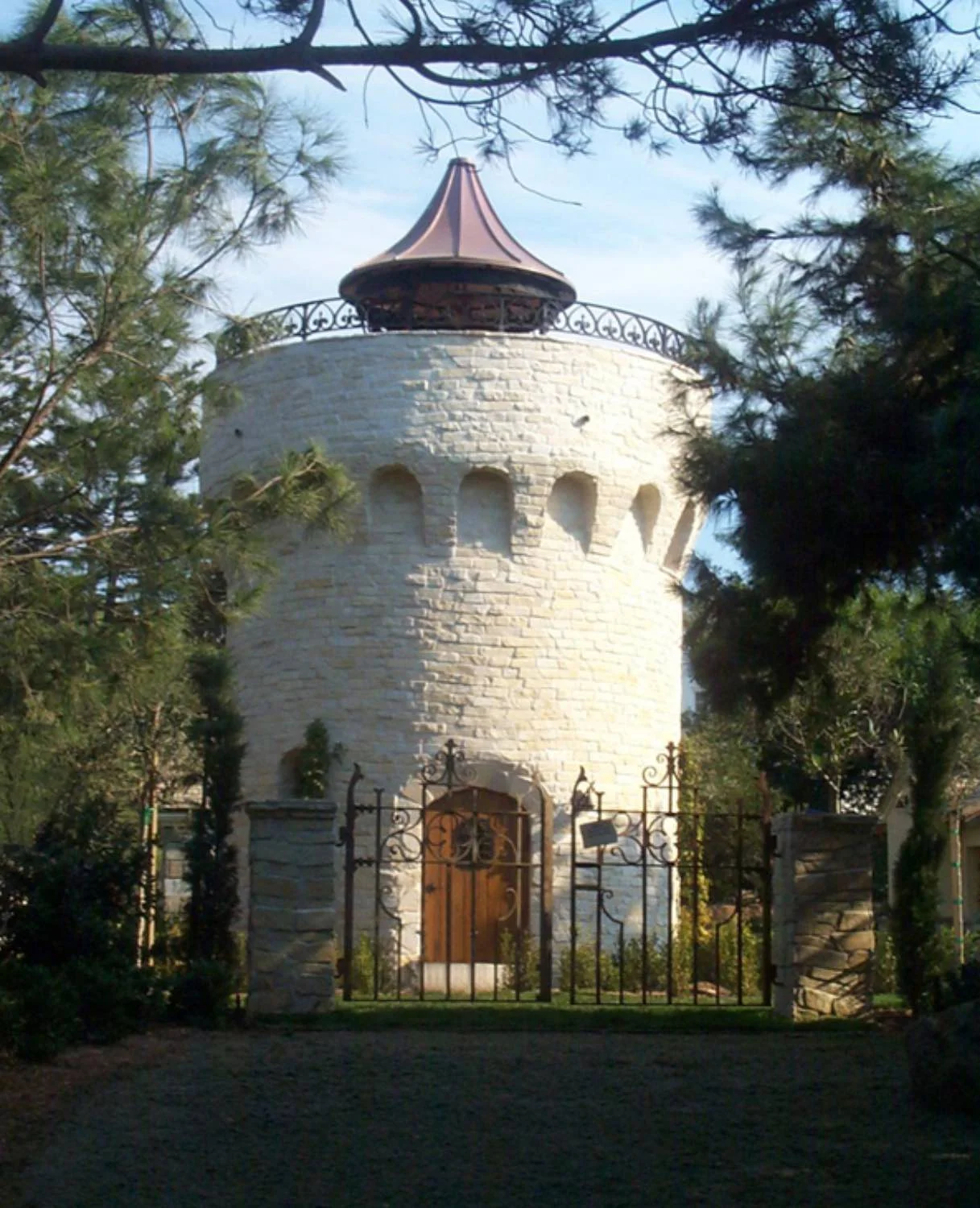  Stone tower with a children's slide inside 