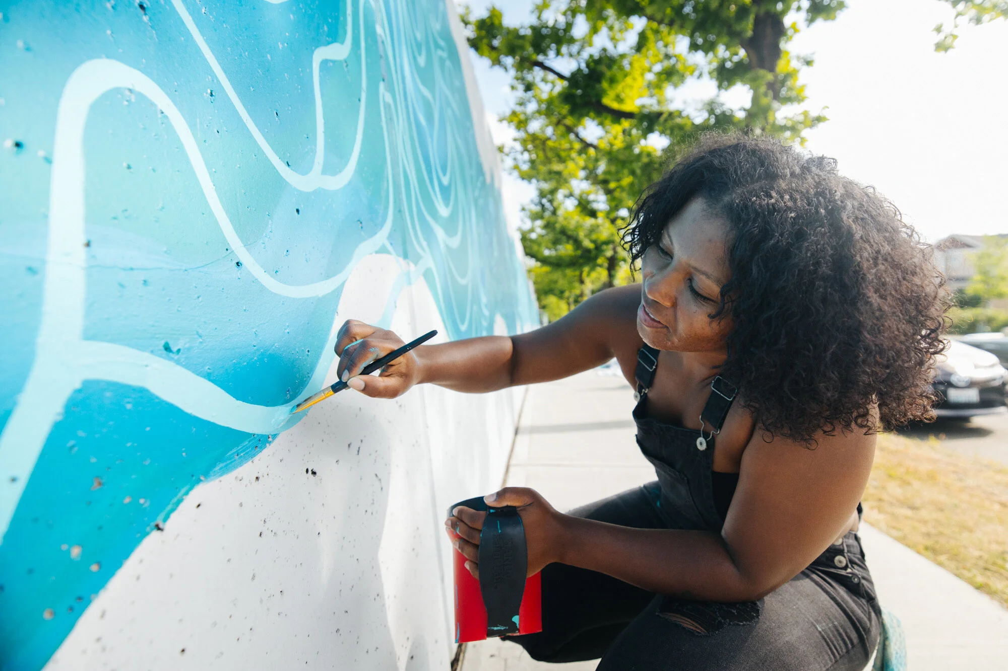  She was asked to create water along the 200+ ft retaining wall. 