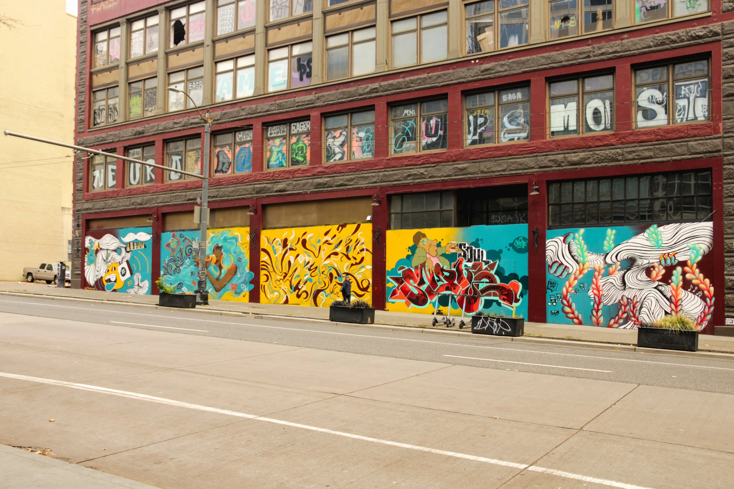  VMC,  Vivid Matter Collective  Members (TDub Customs, Perry Porter, Snekeone, AfroSPK, ArtbreakerBT, and Perri Rhoden) were hired to install one multi-paneled mural alongside the Chromer Building in Downtown Seattle. They were hired to beautify the 