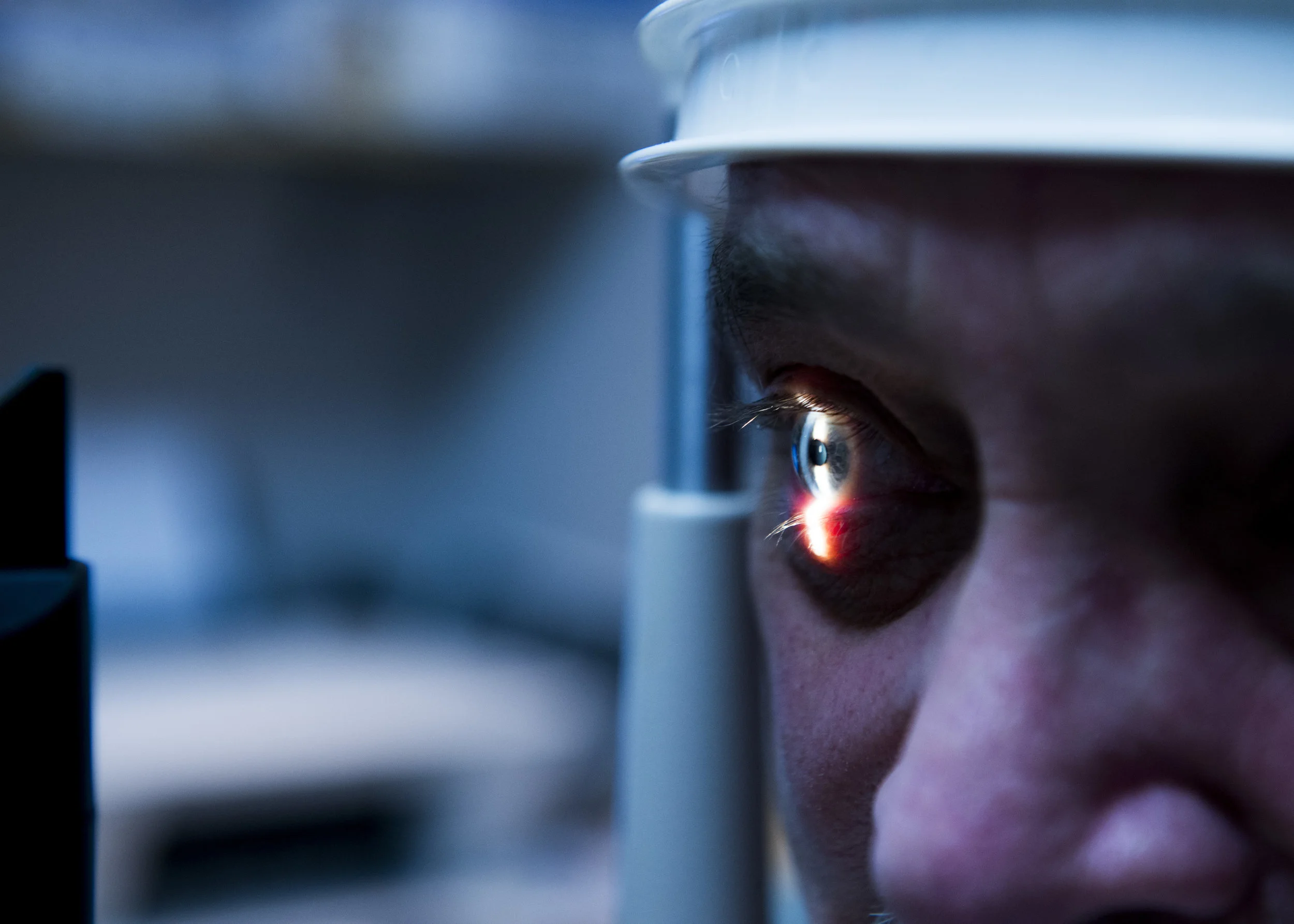  A patient get his eyes checked by Optometrist Dr. Greg Ray. 