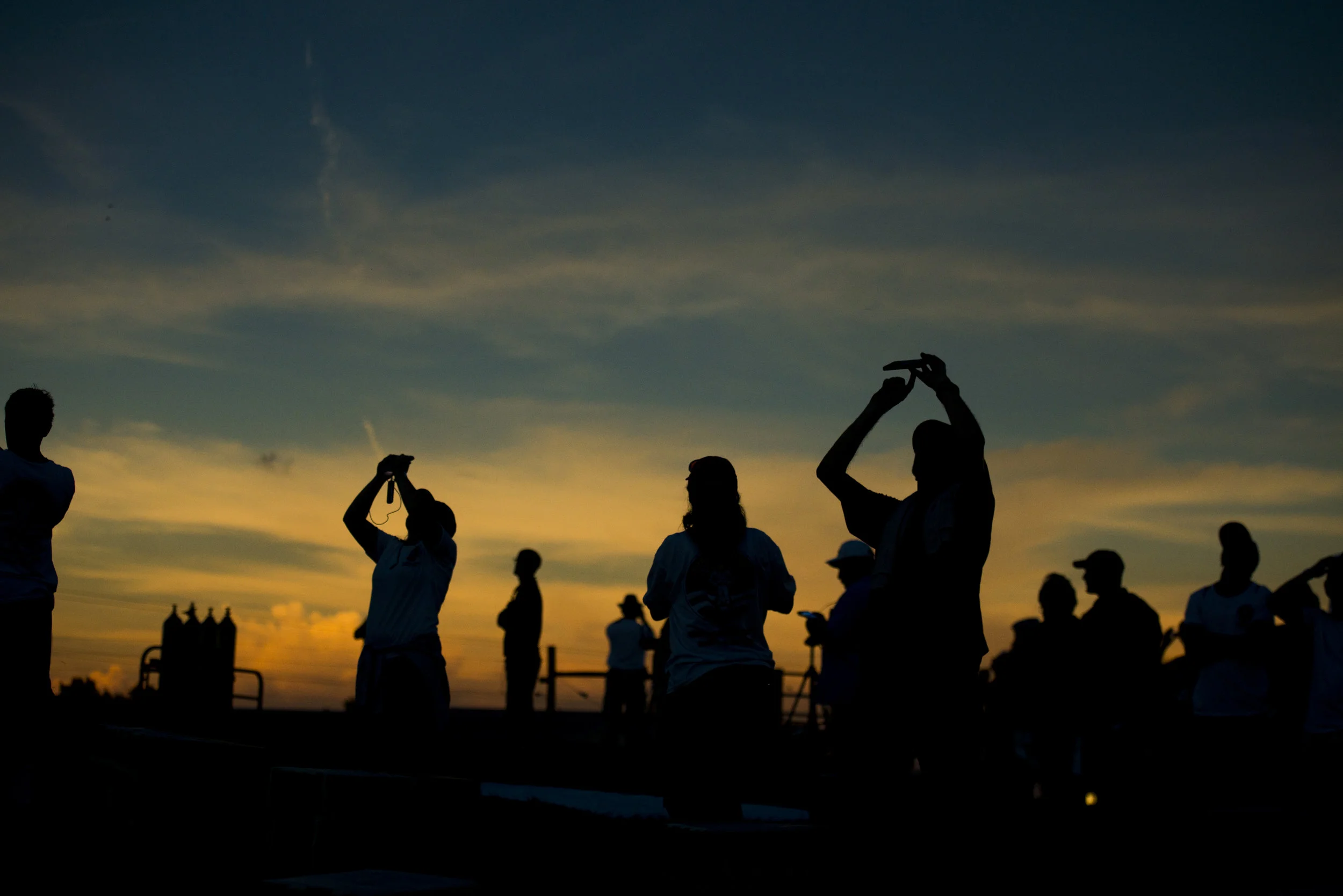  Students and scientists take photos during eclipse totality at APSU's farm in Clarksville on August 21, 2017.&nbsp; 