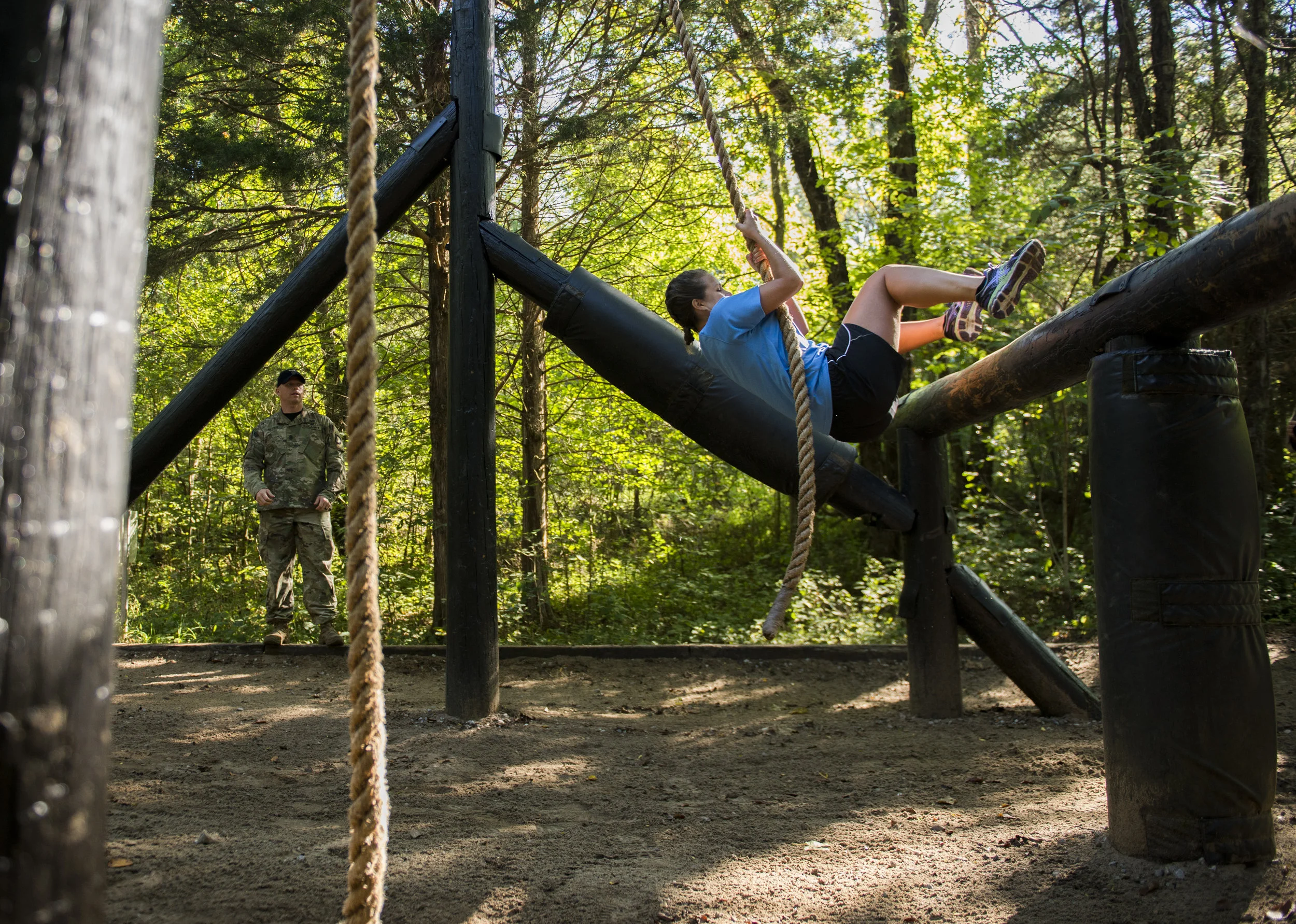  Amanda Bork swings over an obstacle during G.I. Jane Day for the wives of Tennessee Titans players/coaching staff, and cheerleaders. 