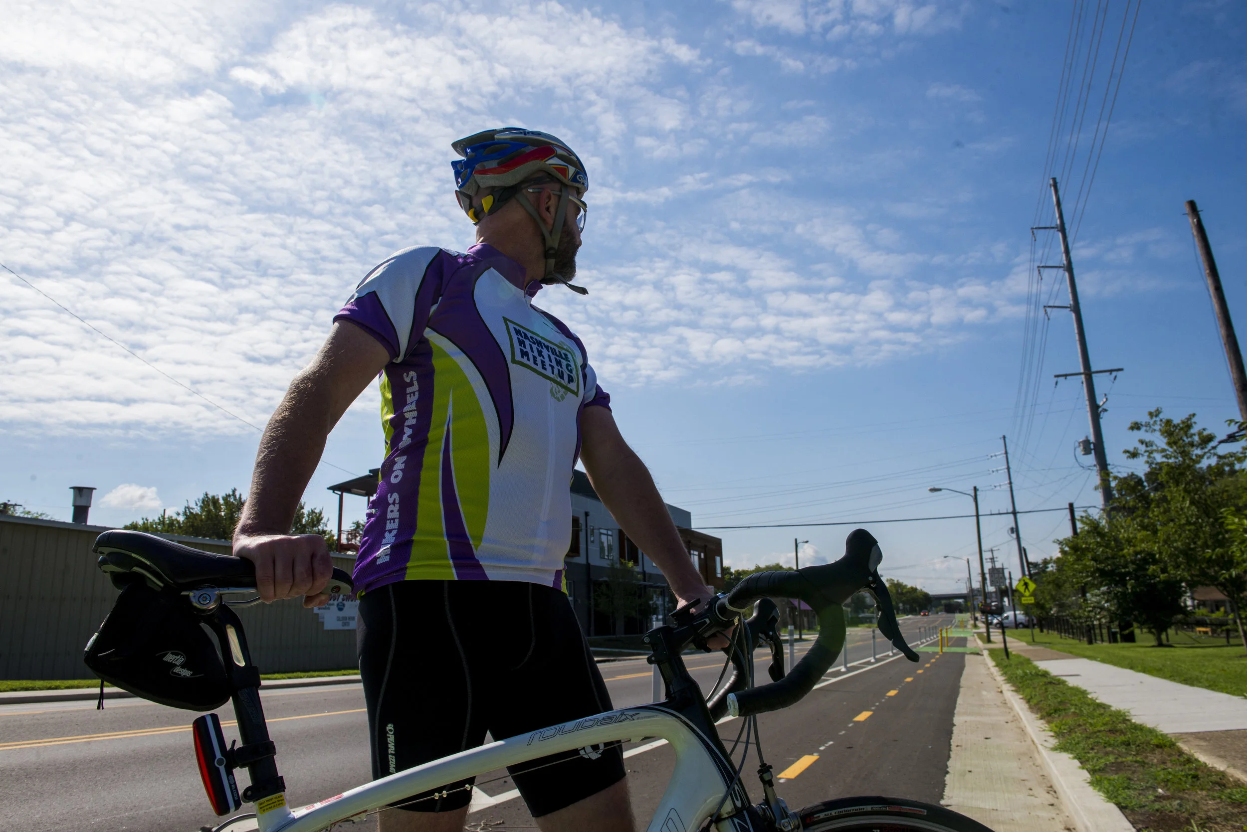  Victor Wilson stands with his road bike on the new bike lane on 51st Avenue in the Nations on August 23, 2017. 