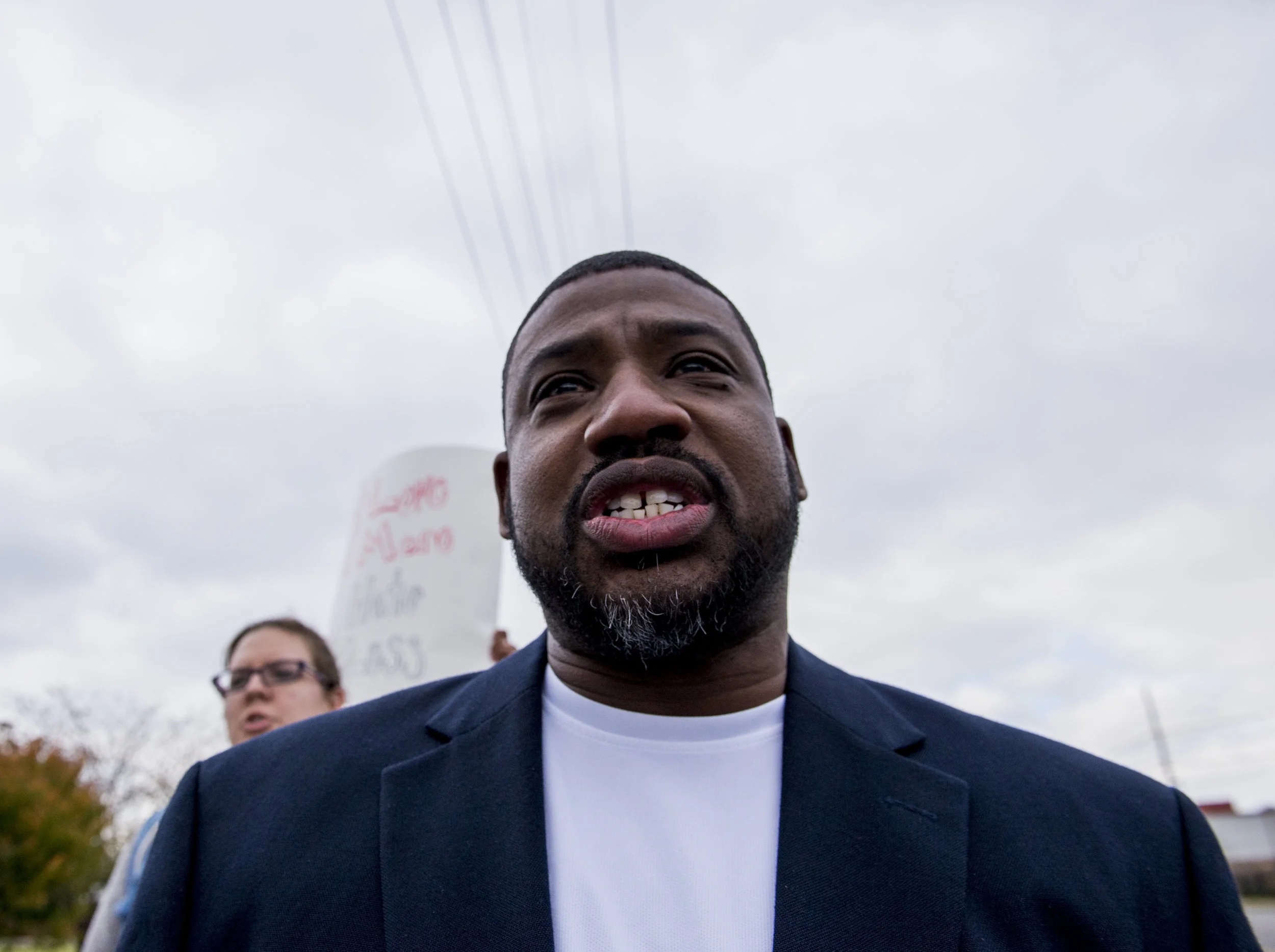  Sean Cook, a pastor at Key Stewart Methodist Church in Gallatin, shouts "Refugees are welcome here," as he marches along with hundreds of other counter-protestors in Murfreesboro on October 28, 2017. 