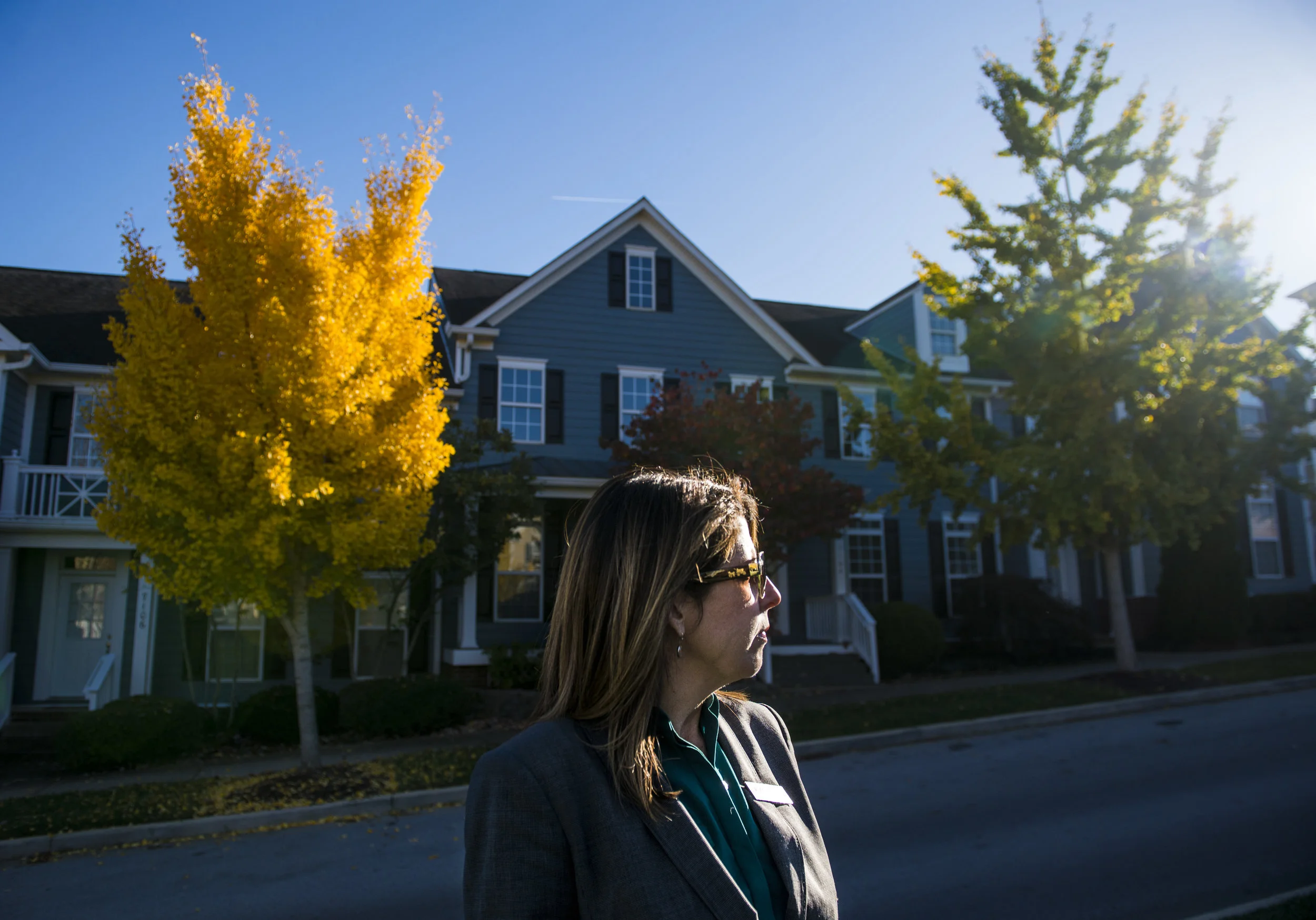  Gretchen Fitzsimmons, a Re/Max Realtor, stands in front of town homes at Lenox Village in Nashville on November 9, 2017. Fitzsimmons recently sold a property there to a millennial buyer.&nbsp; 