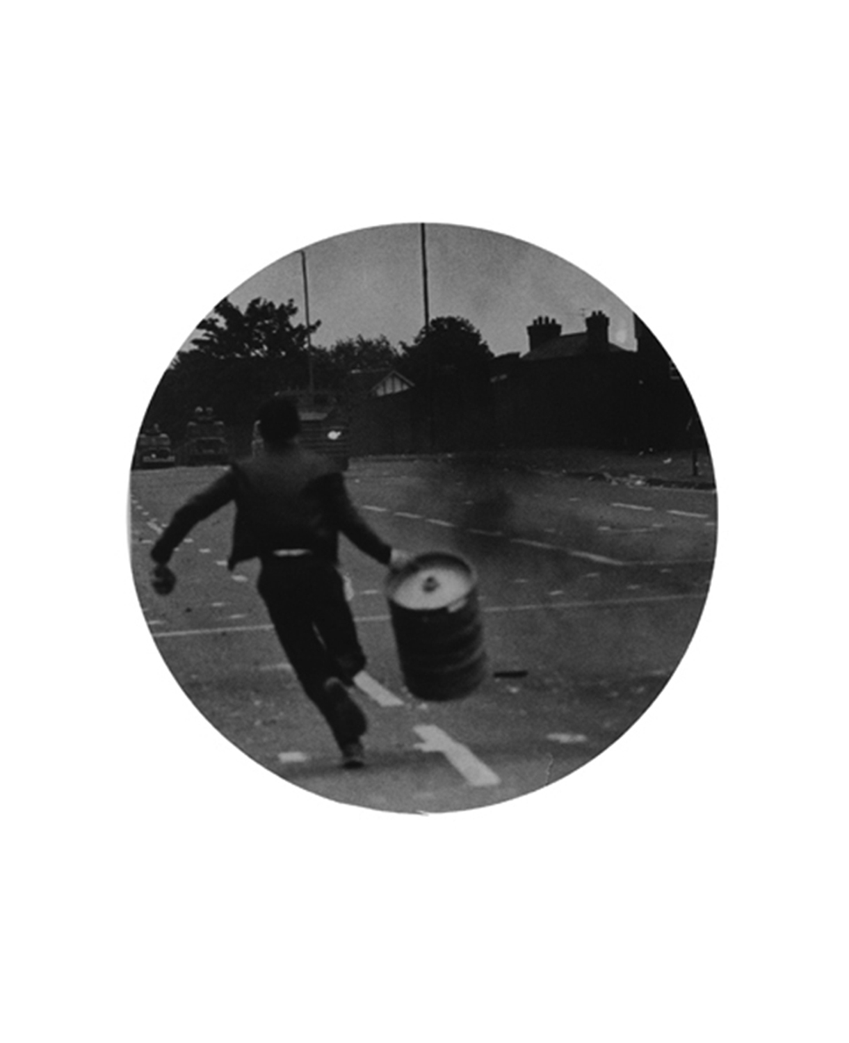  Untitled (Boy running with barrel) 
