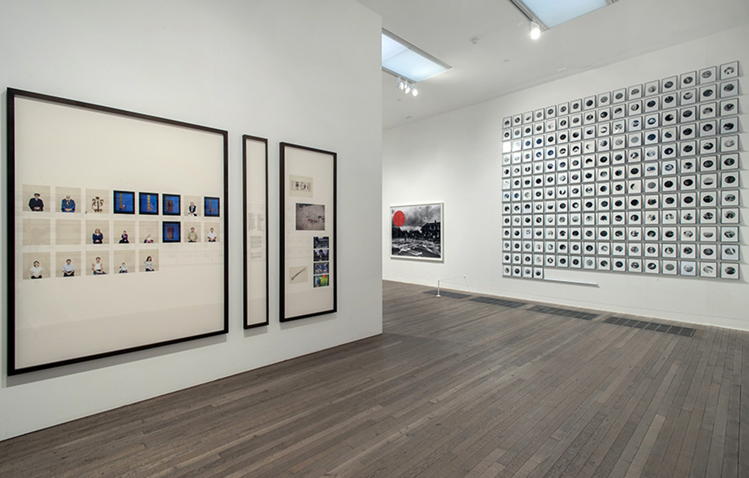  People in Trouble Laughing Pushed to the Ground (Dots), Installation View, Conflict, Time, Photography, image © Tate Modern, London, 2015 