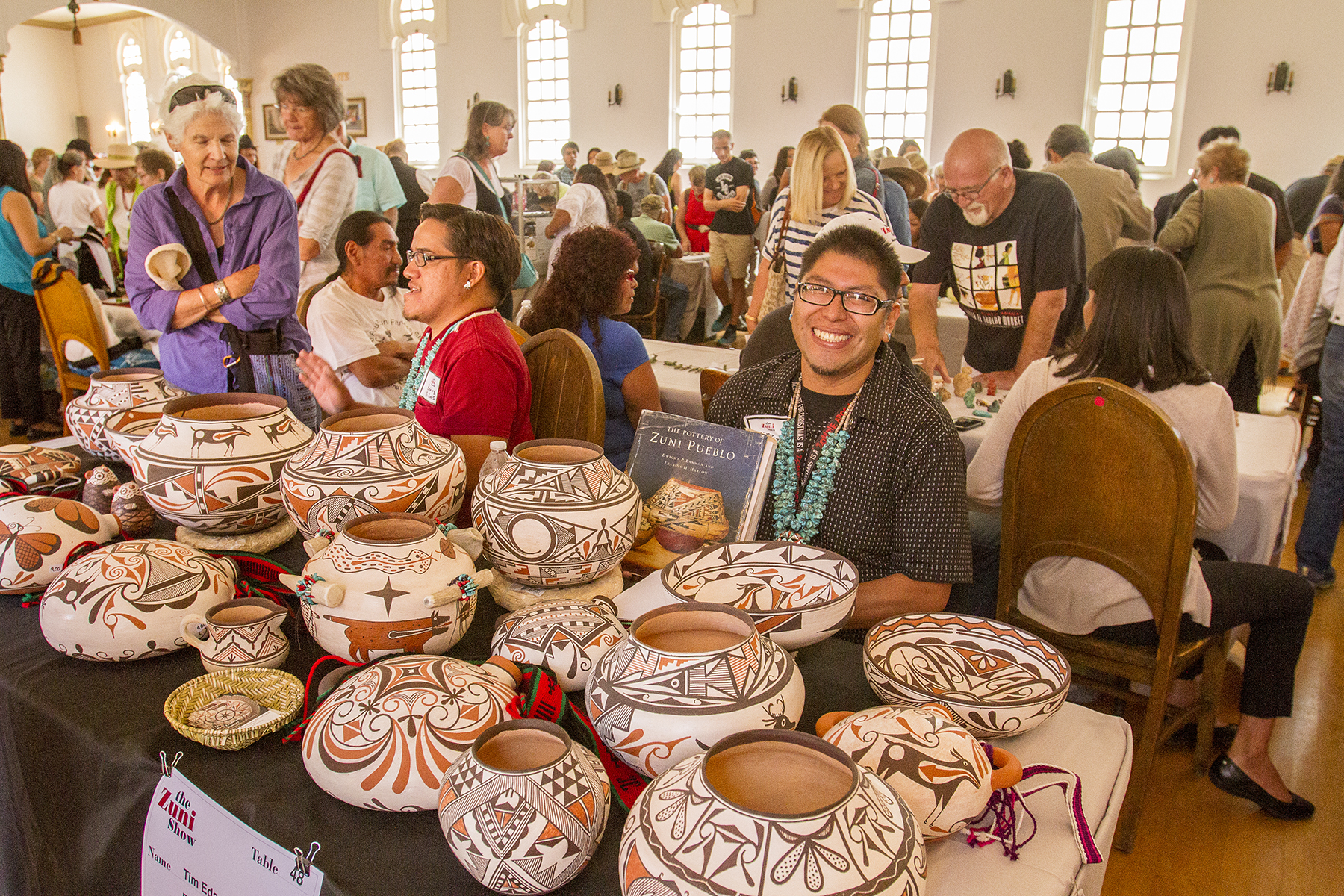 Tim Edaakie and Bobby Silas display their fine pottery.