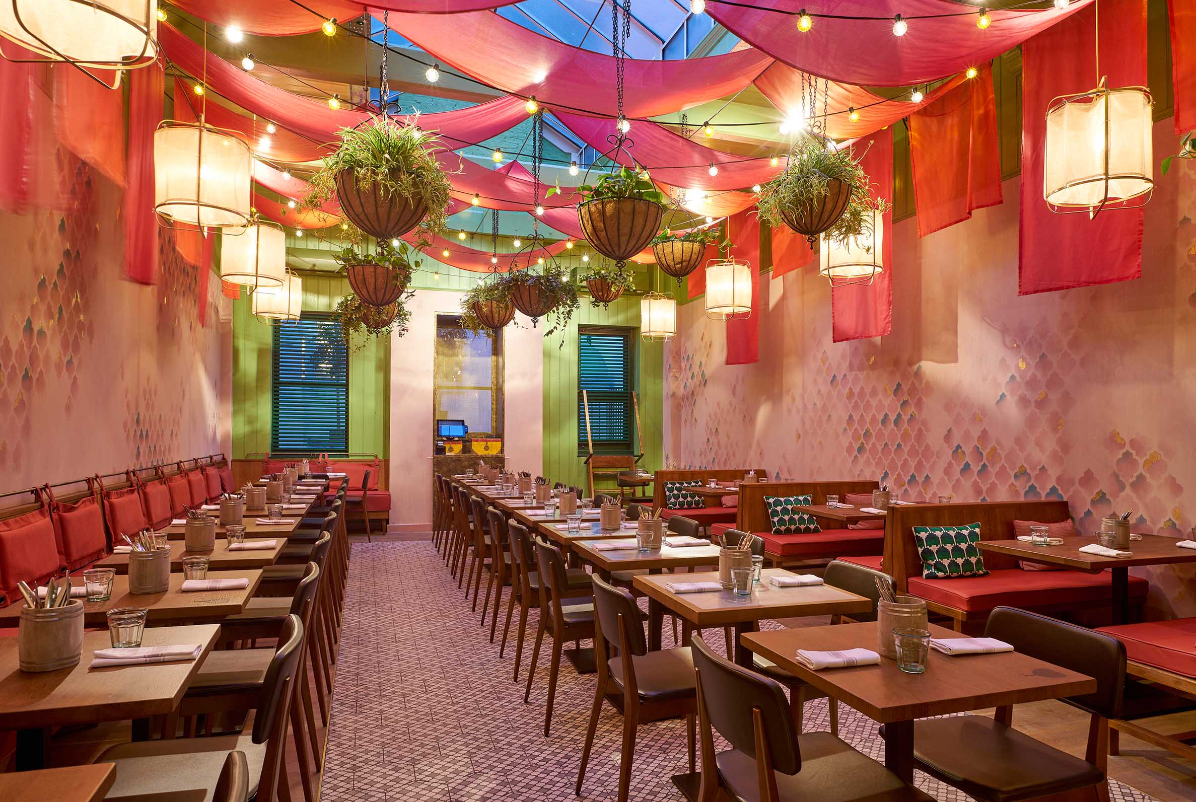 Hand-stencilled indian motifs depict a distressed tile effect, with accents of gold leaf.