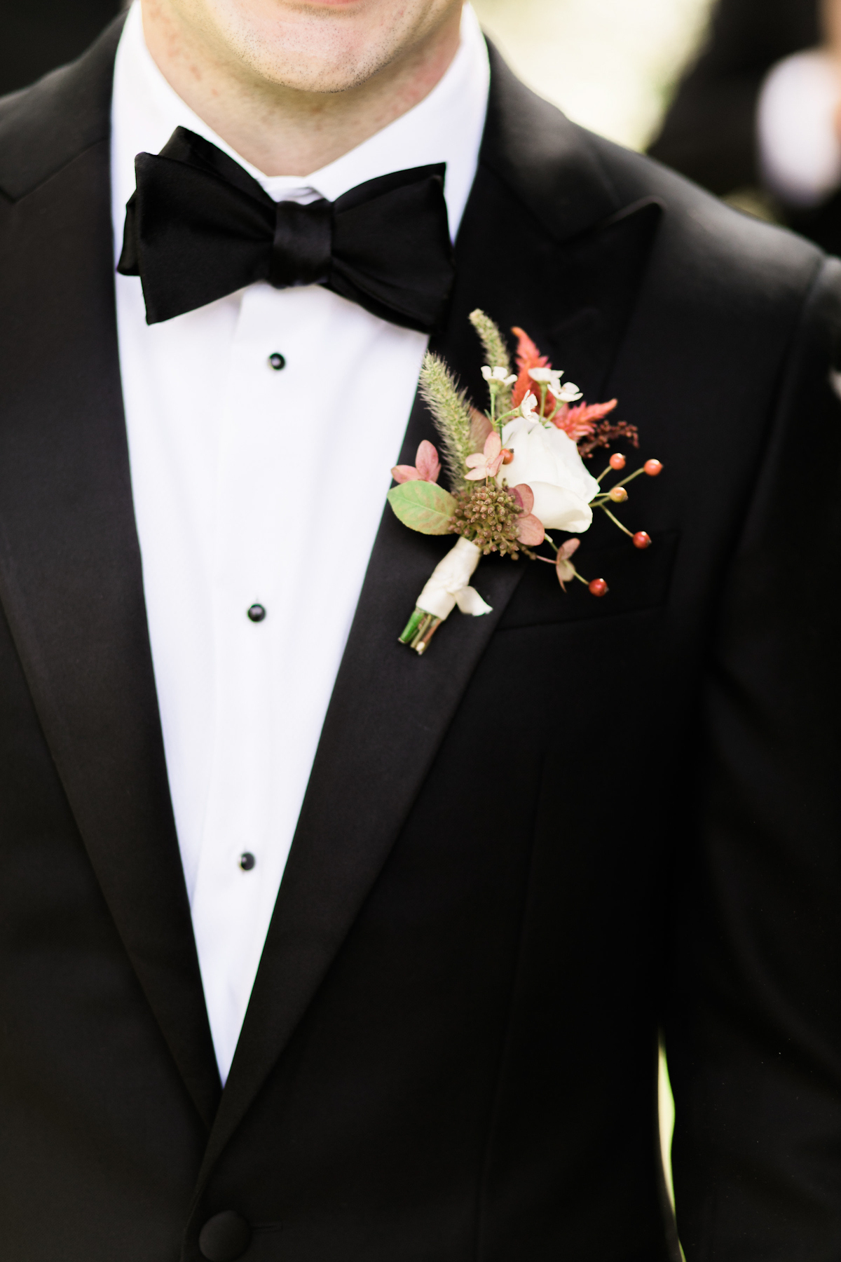 Black tuxedo and boutonniere for Plaza wedding