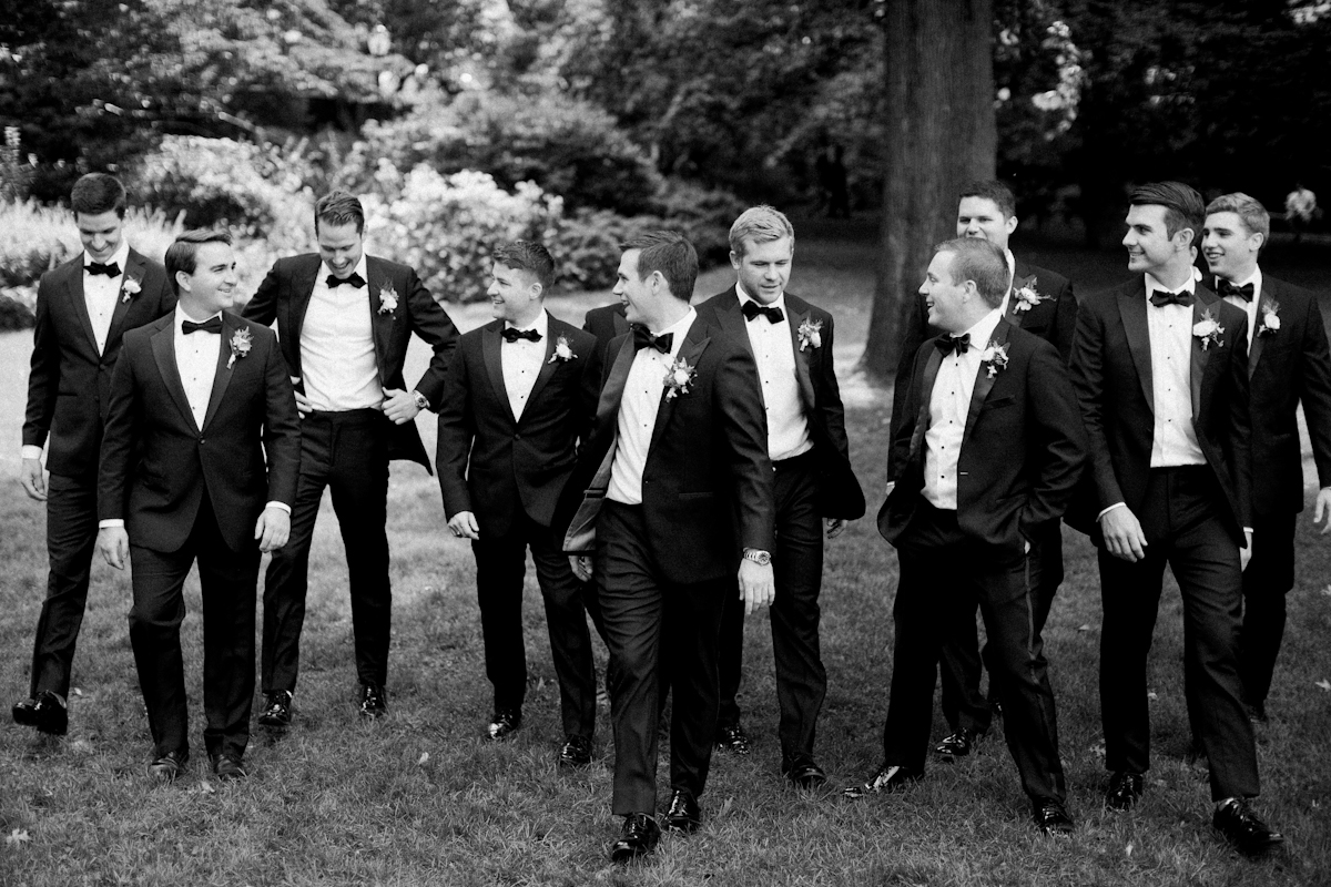 Groom and groomsmen in tuxedos at Plaza wedding