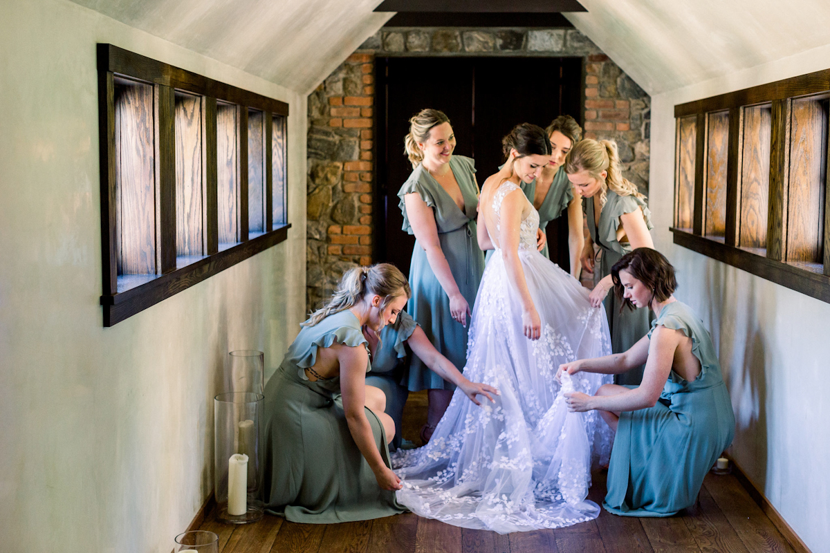 Blue Hill at Stone Barns bride and bridesmaids in green