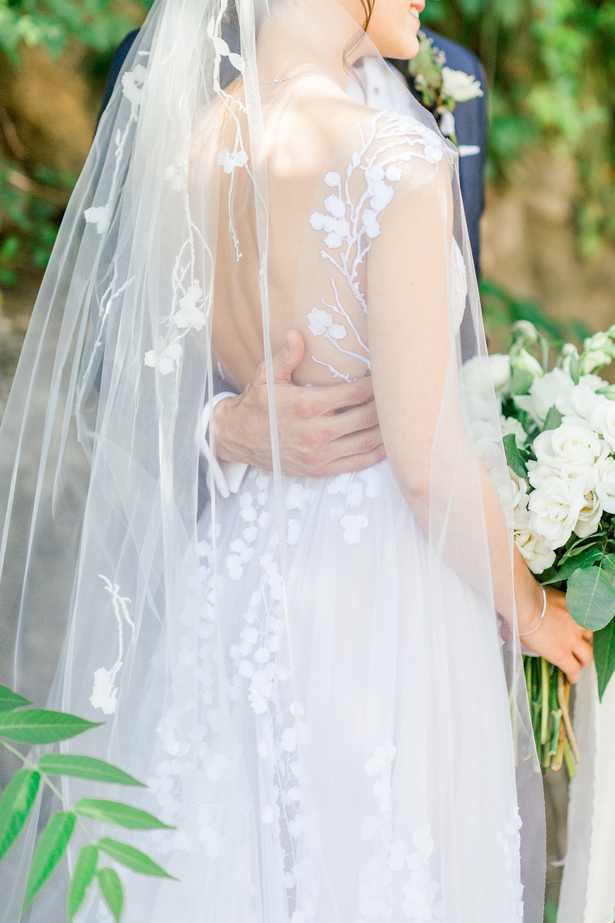 Bride in elegant gown with veil at Blue Hill at Stone Barns wedding