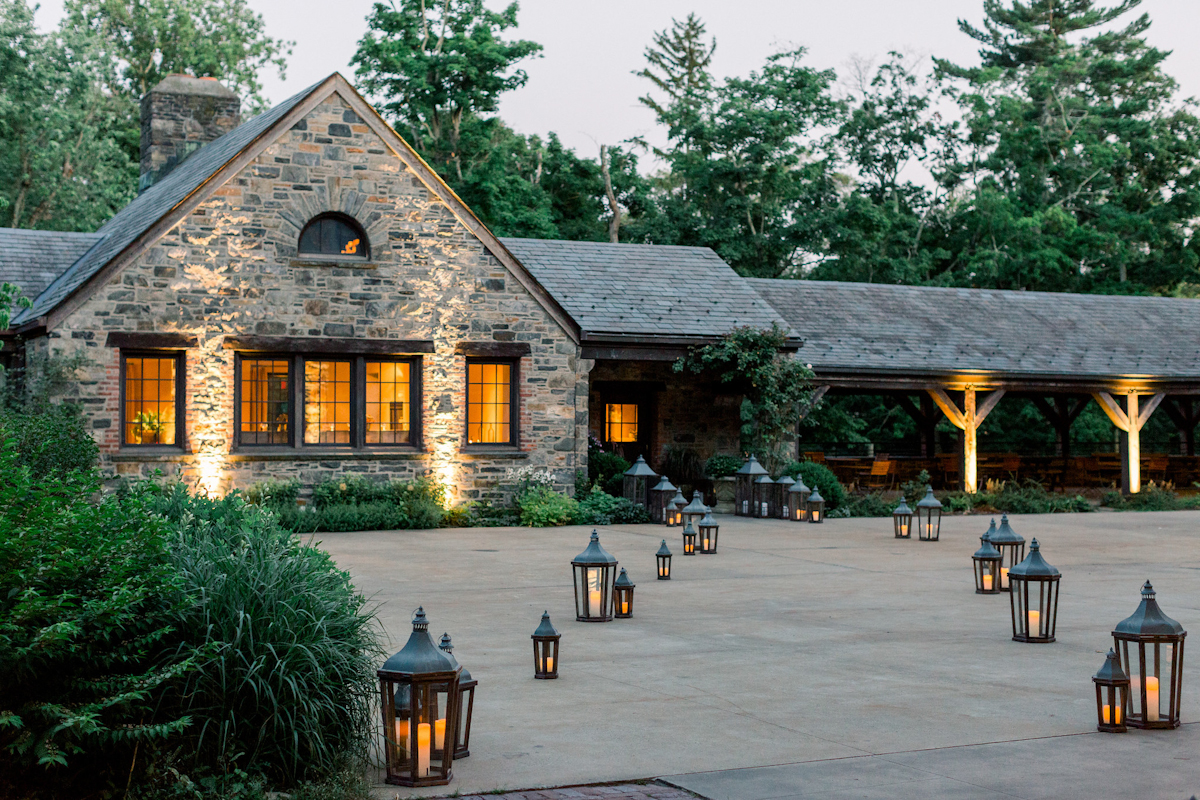 Blue Hill at Stone Barns courtyard with pathway lined by lanterns