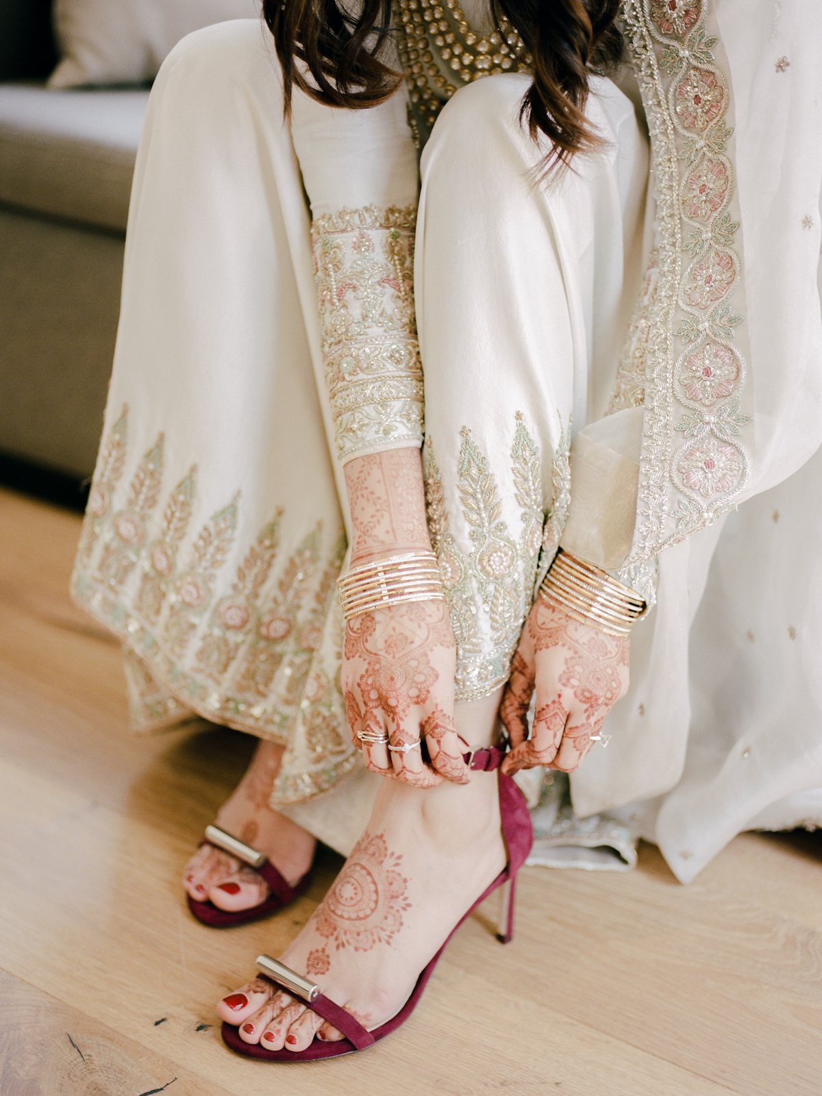 Bride putting on her wedding shoes for Rainbow Room wedding