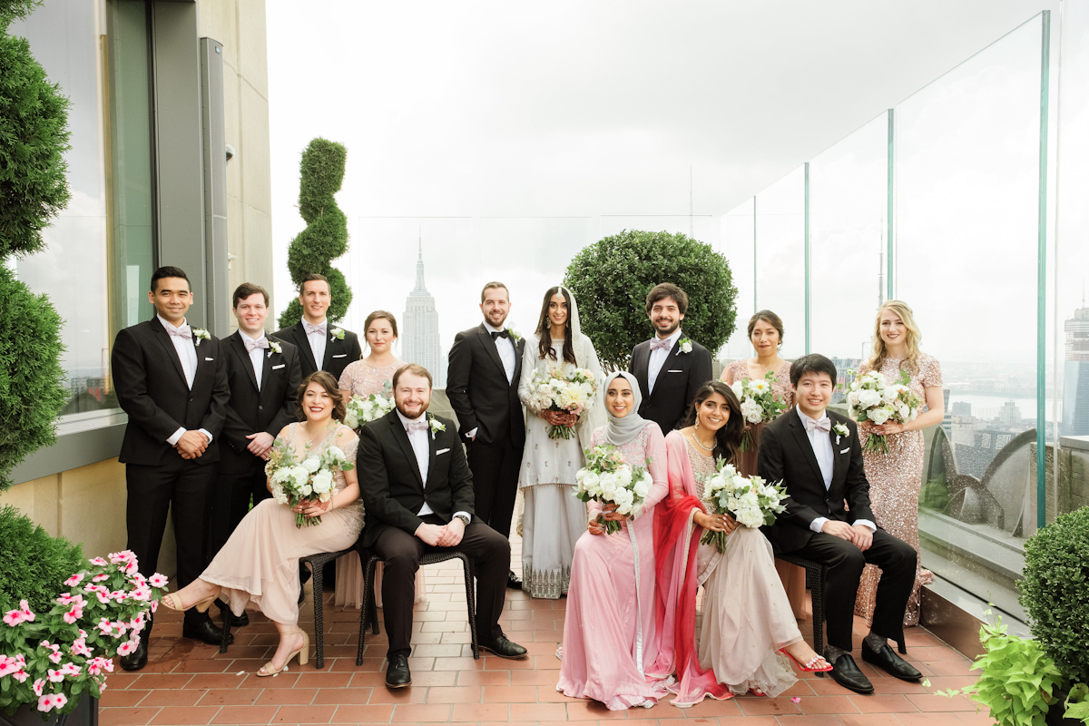 Bridal party at Rainbow Room wedding in pink and champagne colors