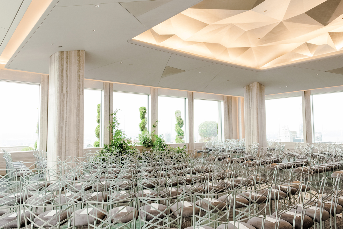 Rainbow Room wedding ceremony chairs and flowers