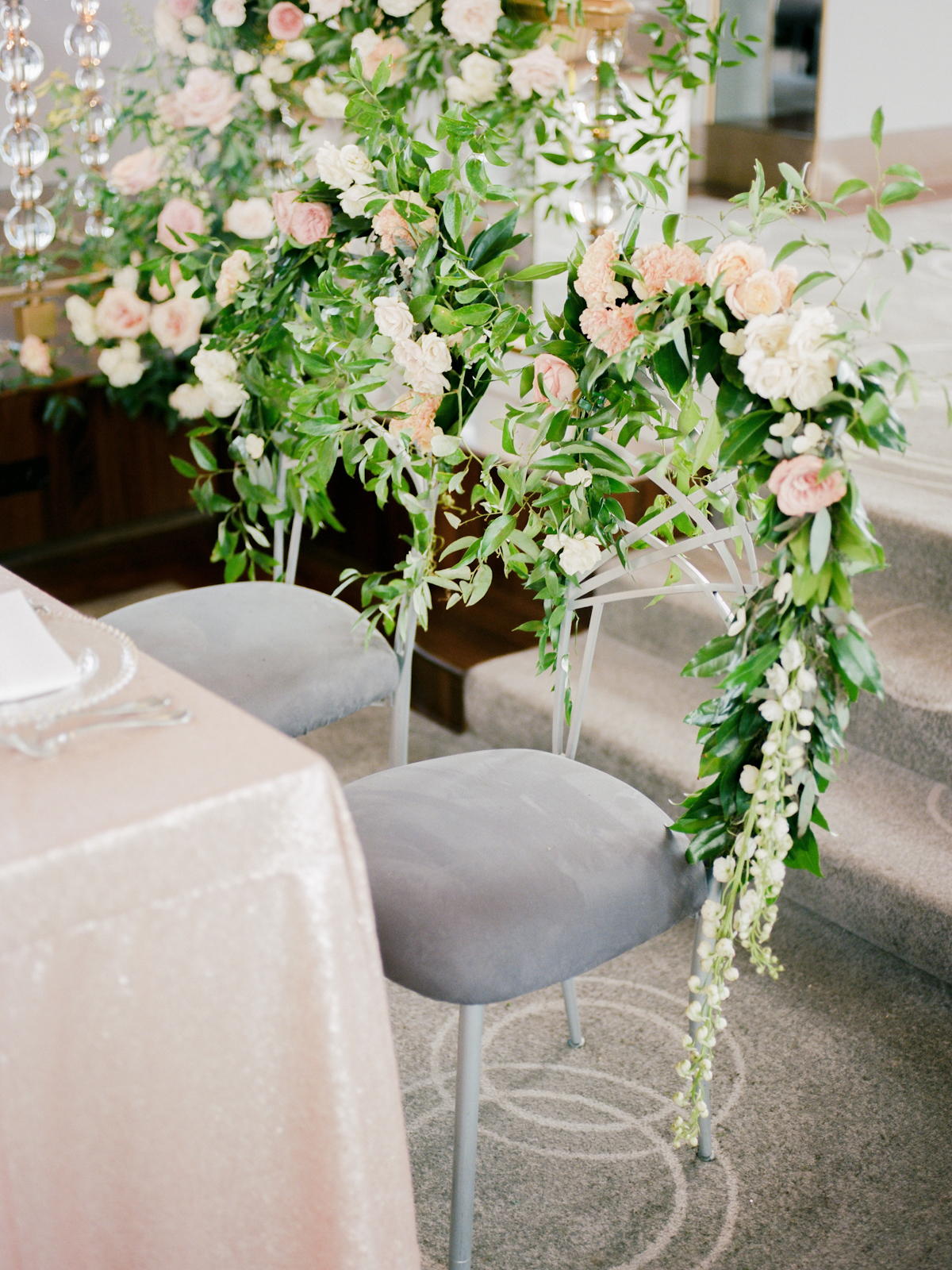 Chairs with floral garlands at Rainbow Room wedding